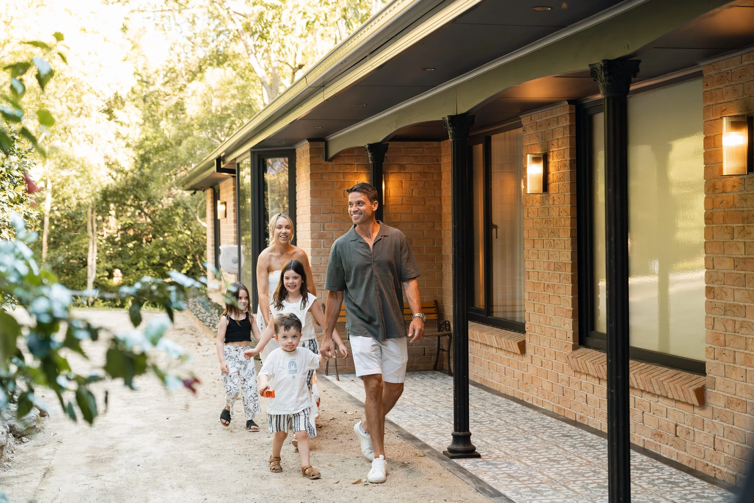 Rachel and Ryan and their kids arriving at their luxury holiday home renovation home while filming their TV show Holiday Home Makeover with Rachel & Ryan, The R&R Design Co.