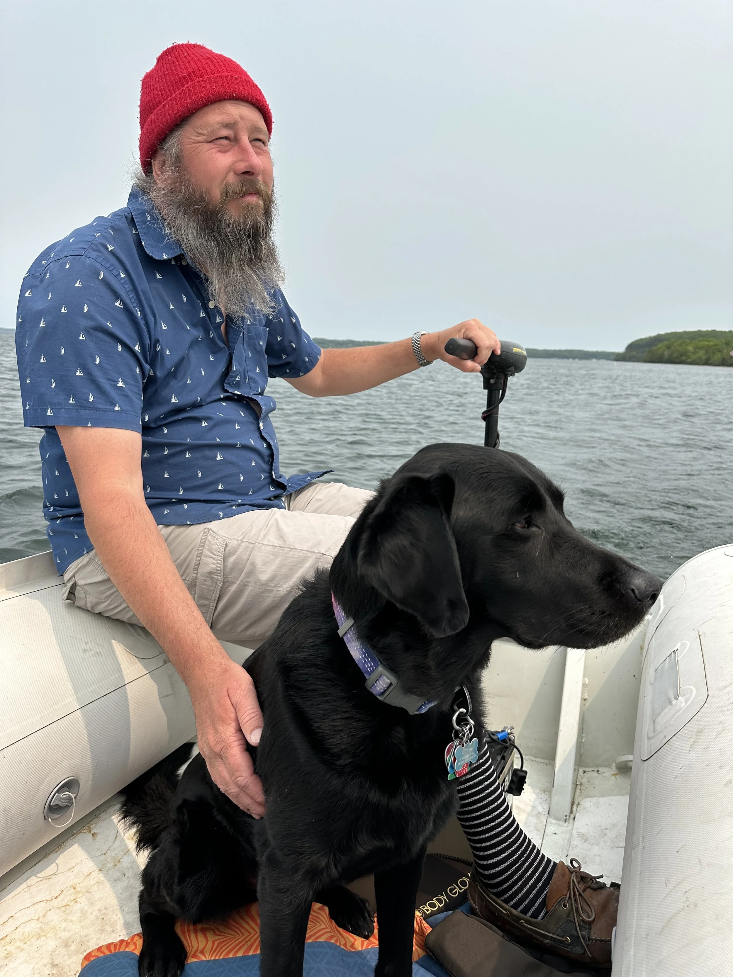 Captain and Kona headed to shore