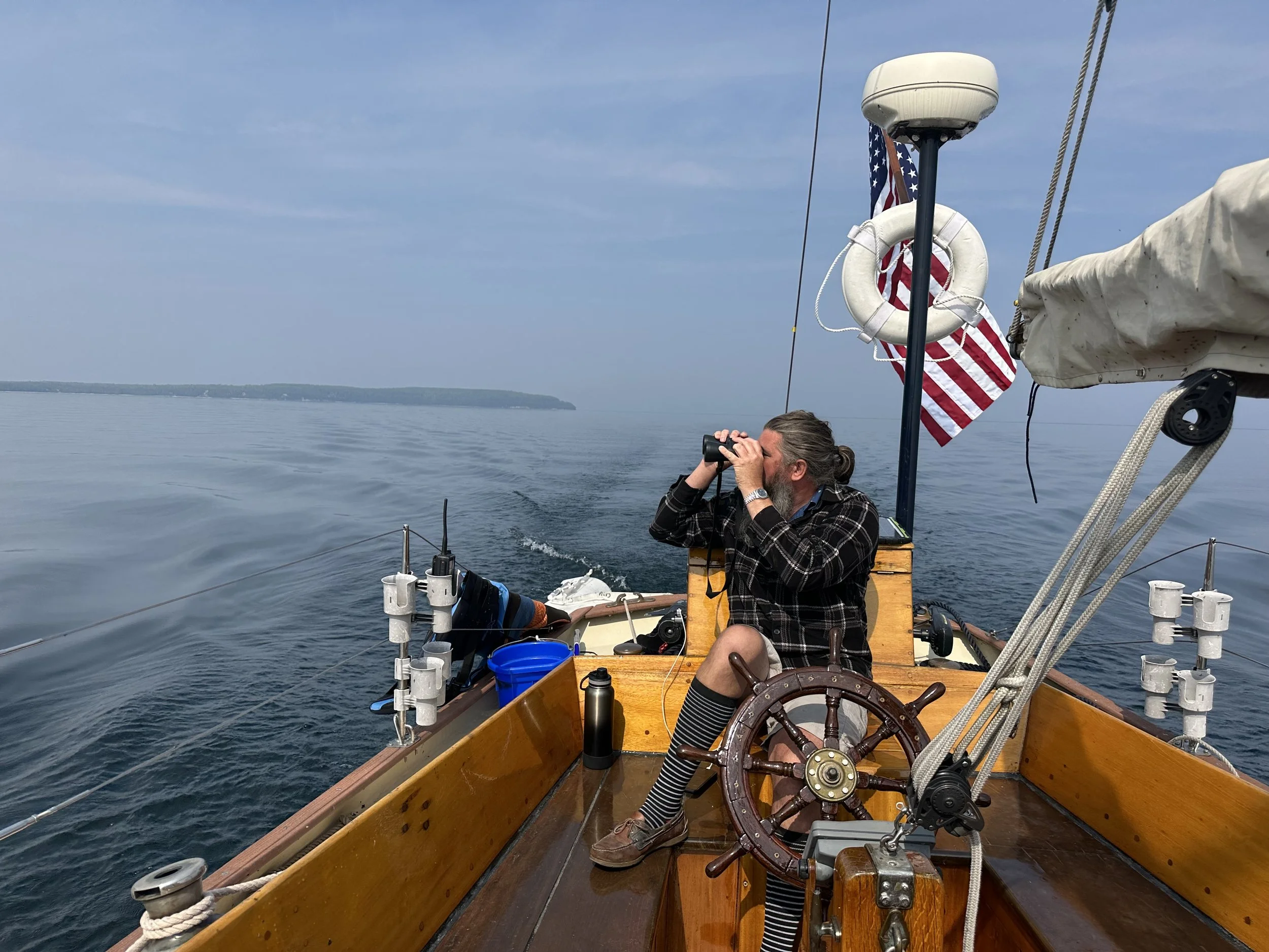 Captain keeping watch at the wheel