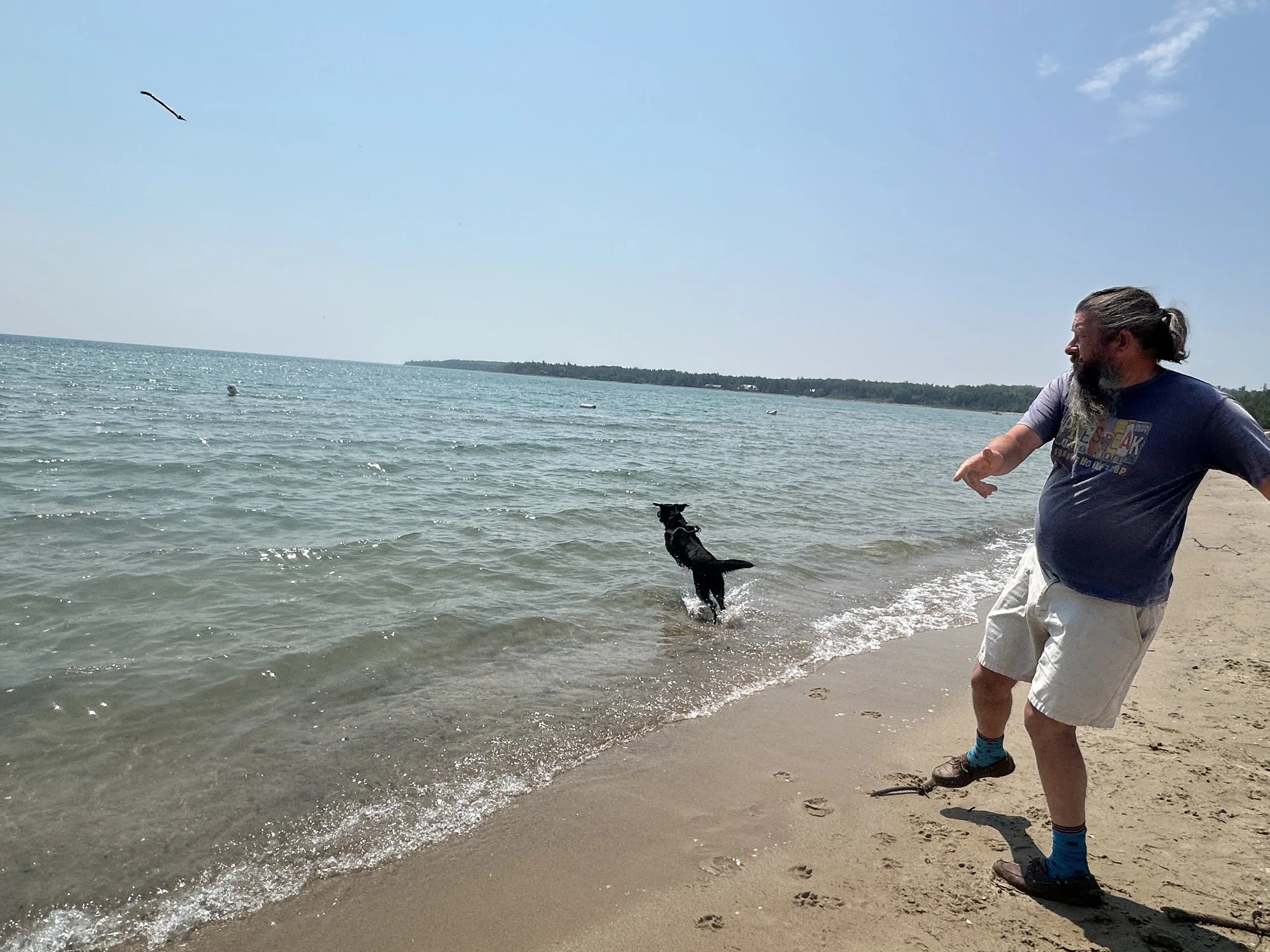 The water is still cold. Kona is the only one going in