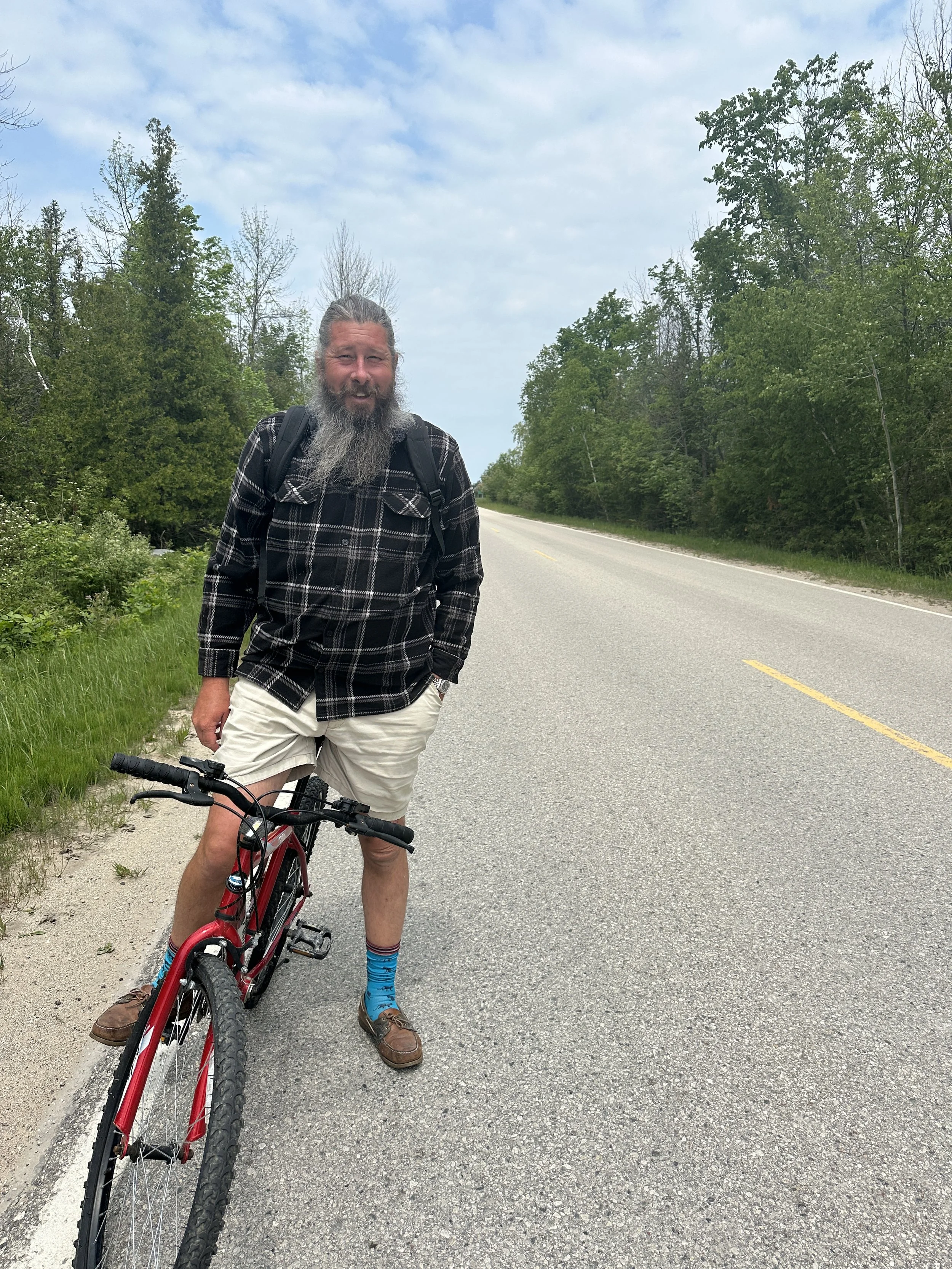 Captain on his small bike