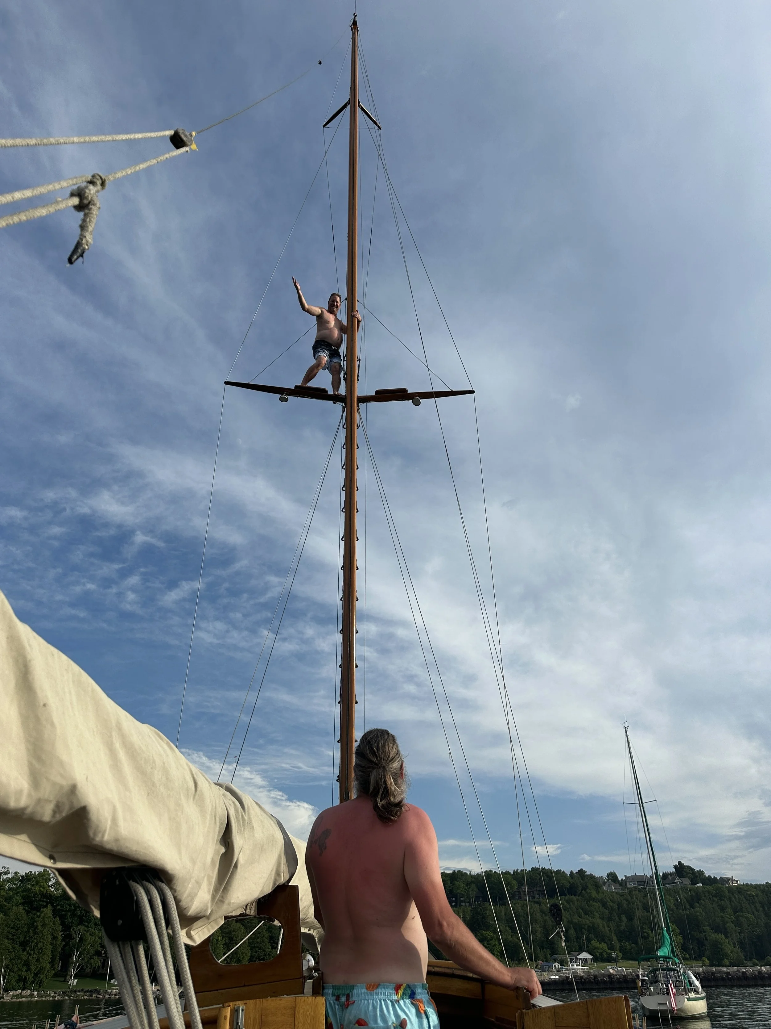 Captain Ryan is crazy at the top of our mast!
