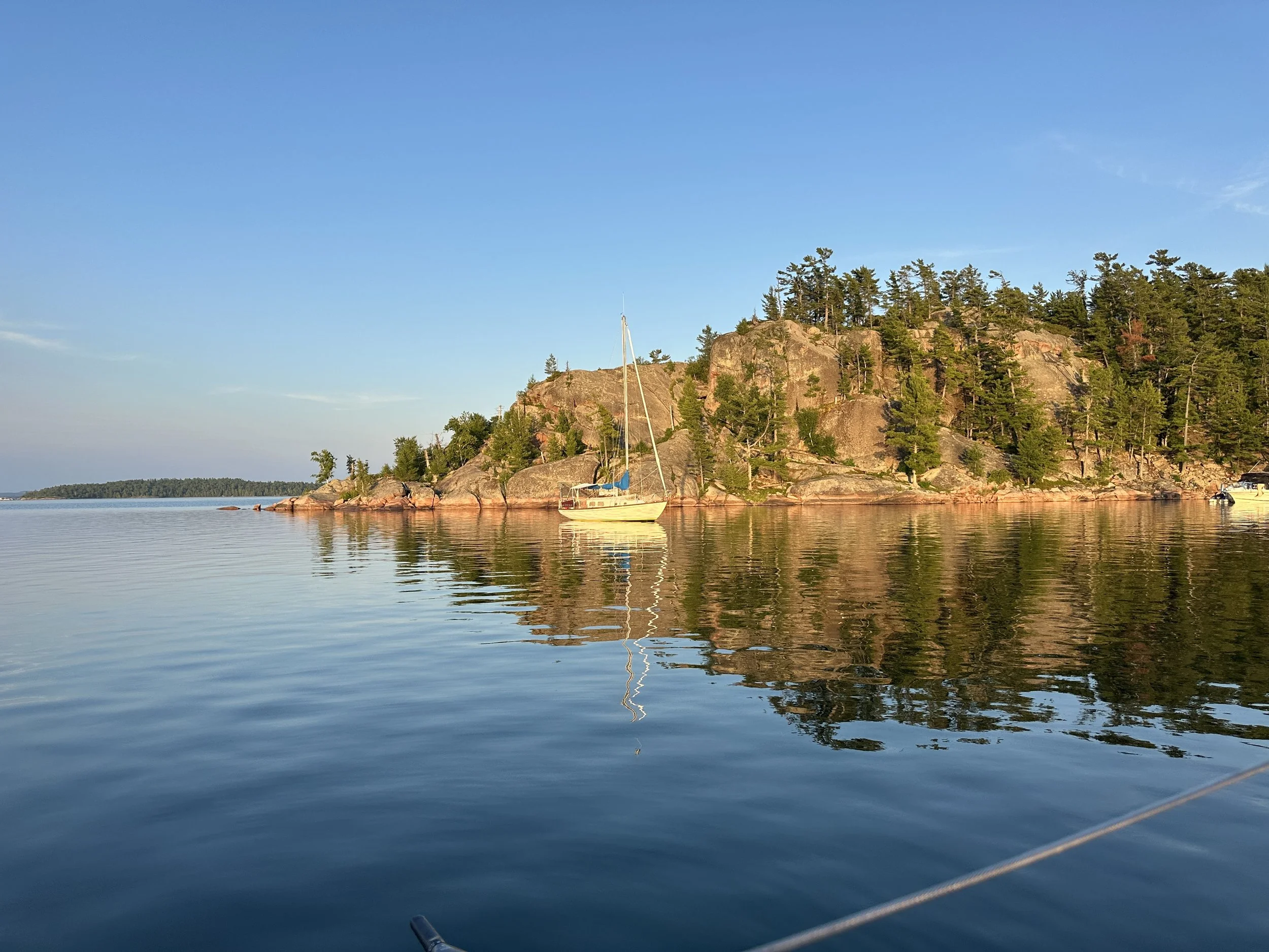 A view from Ciara with the towering rocks of the Benjamins in the golden hour