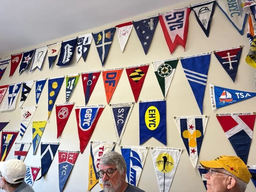 A small sample of all the pennants that have been gifted from all over the world