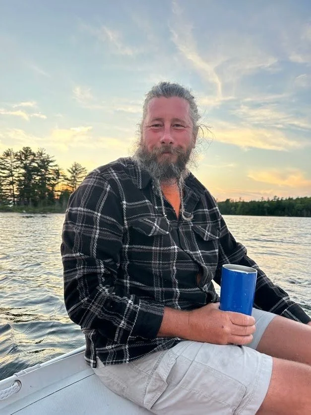 Captain taking me on an evening dinghy ride