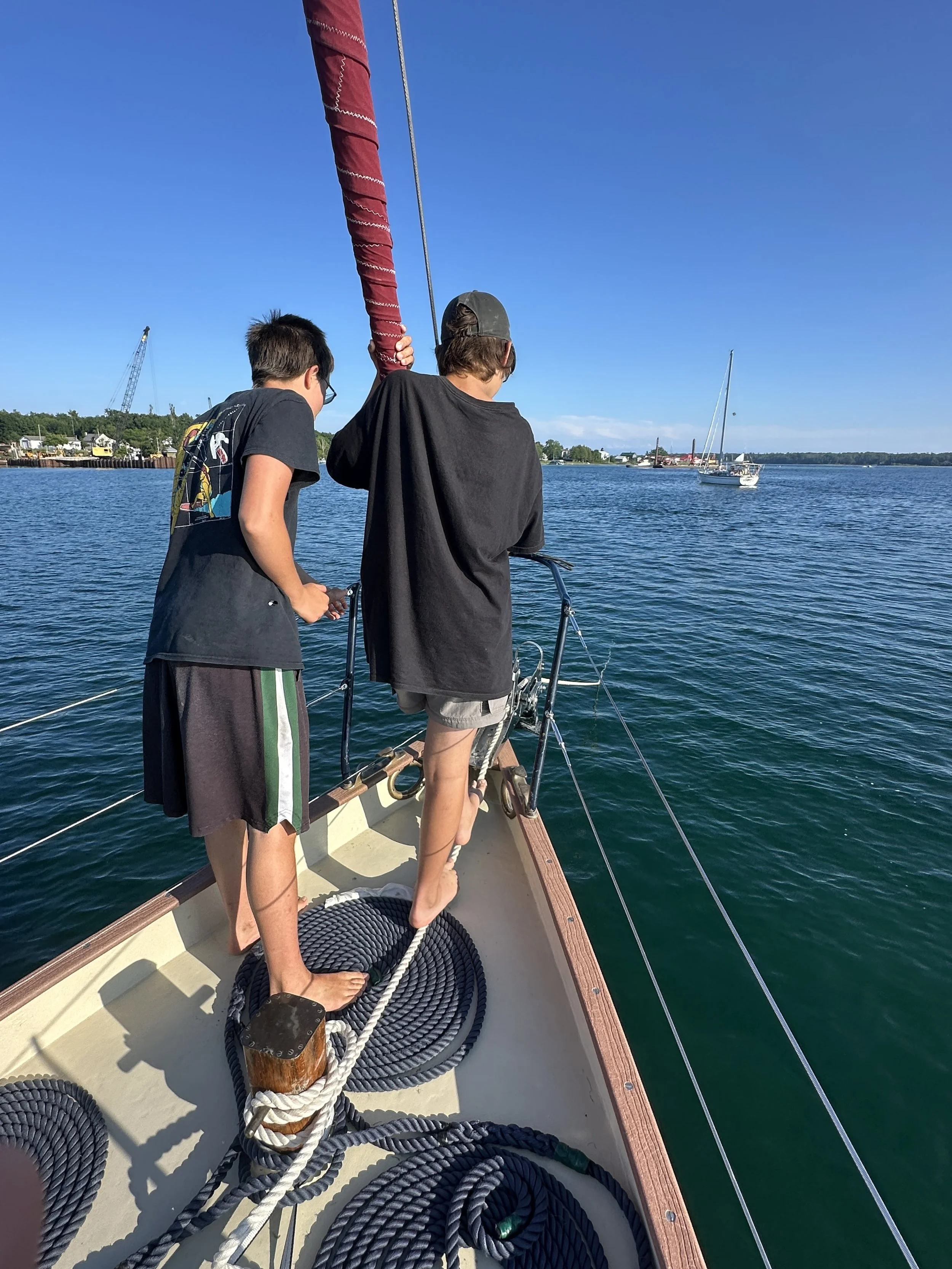 Cory teaching Bert how to set the anchor