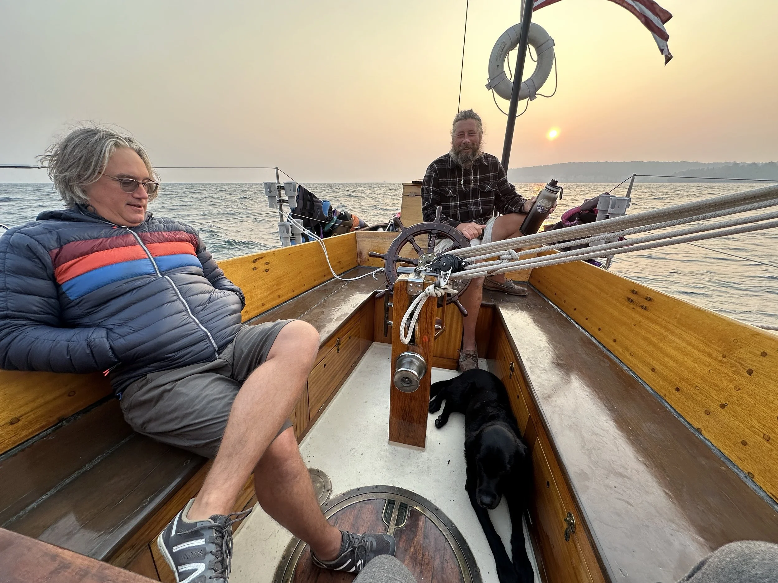 Brett and Captain enjoying the early morning sail