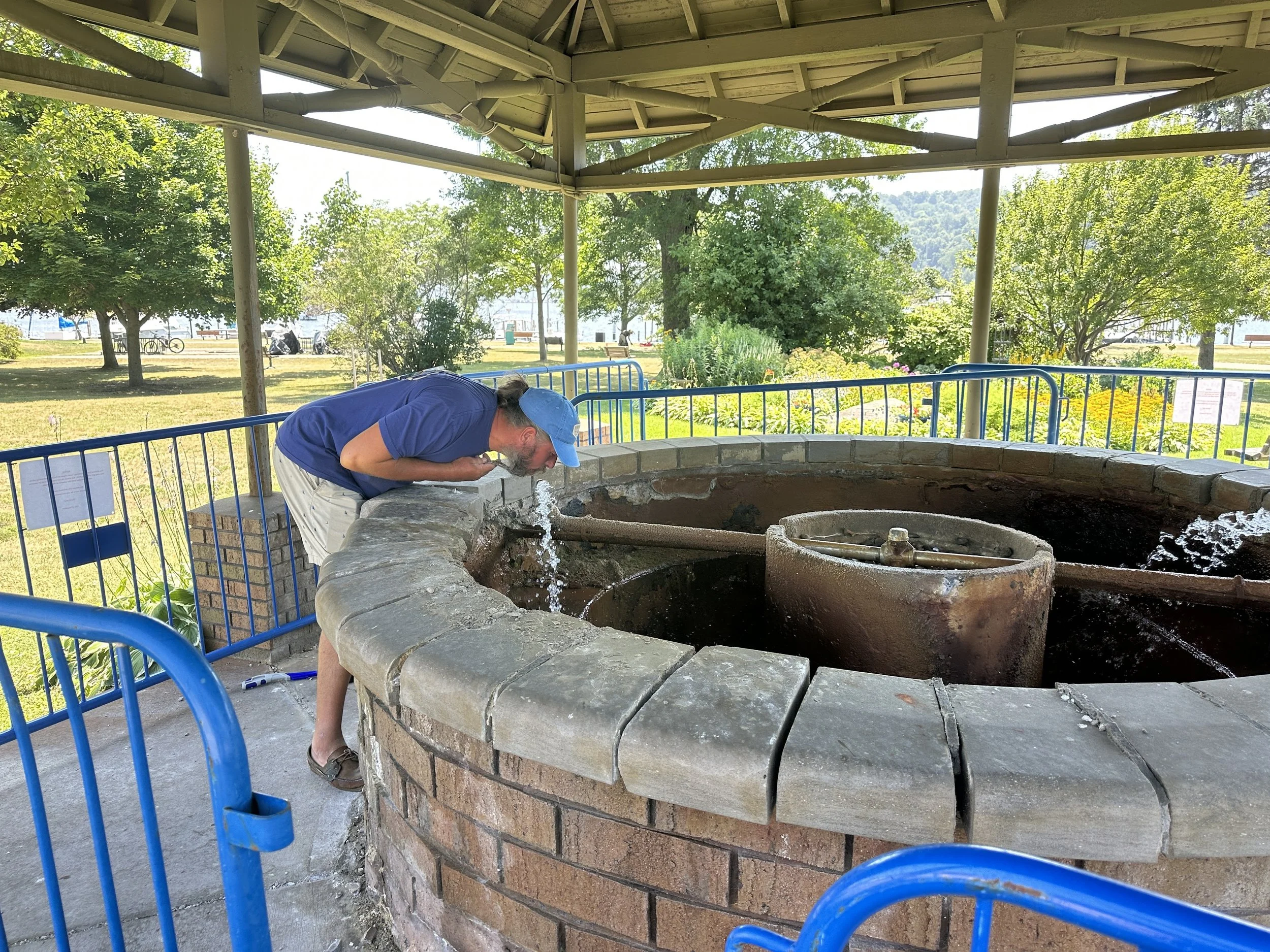Captain drinking from the natural spring