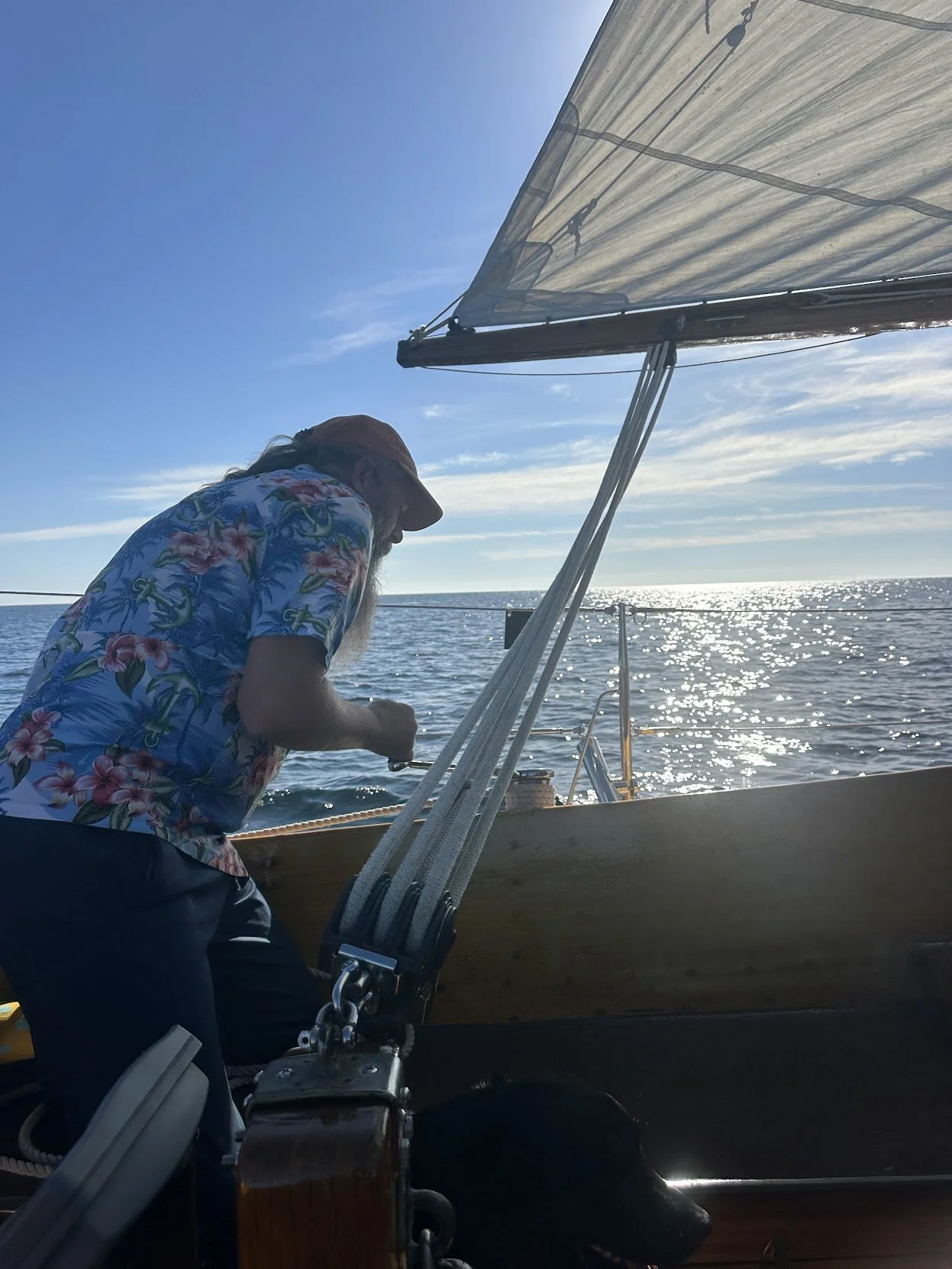 Adjusting sails in early morning light
