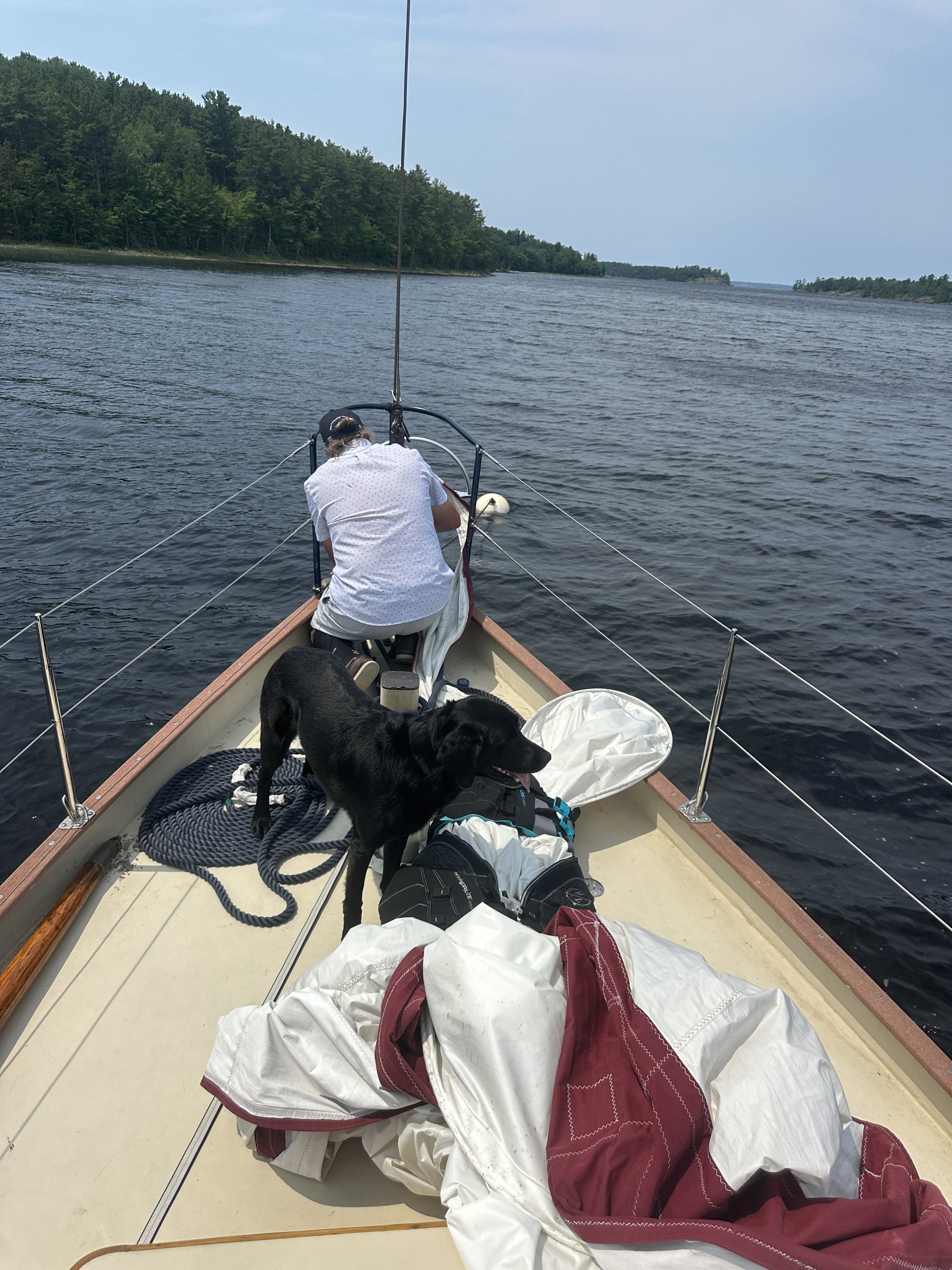 Captain fixing the sail drum