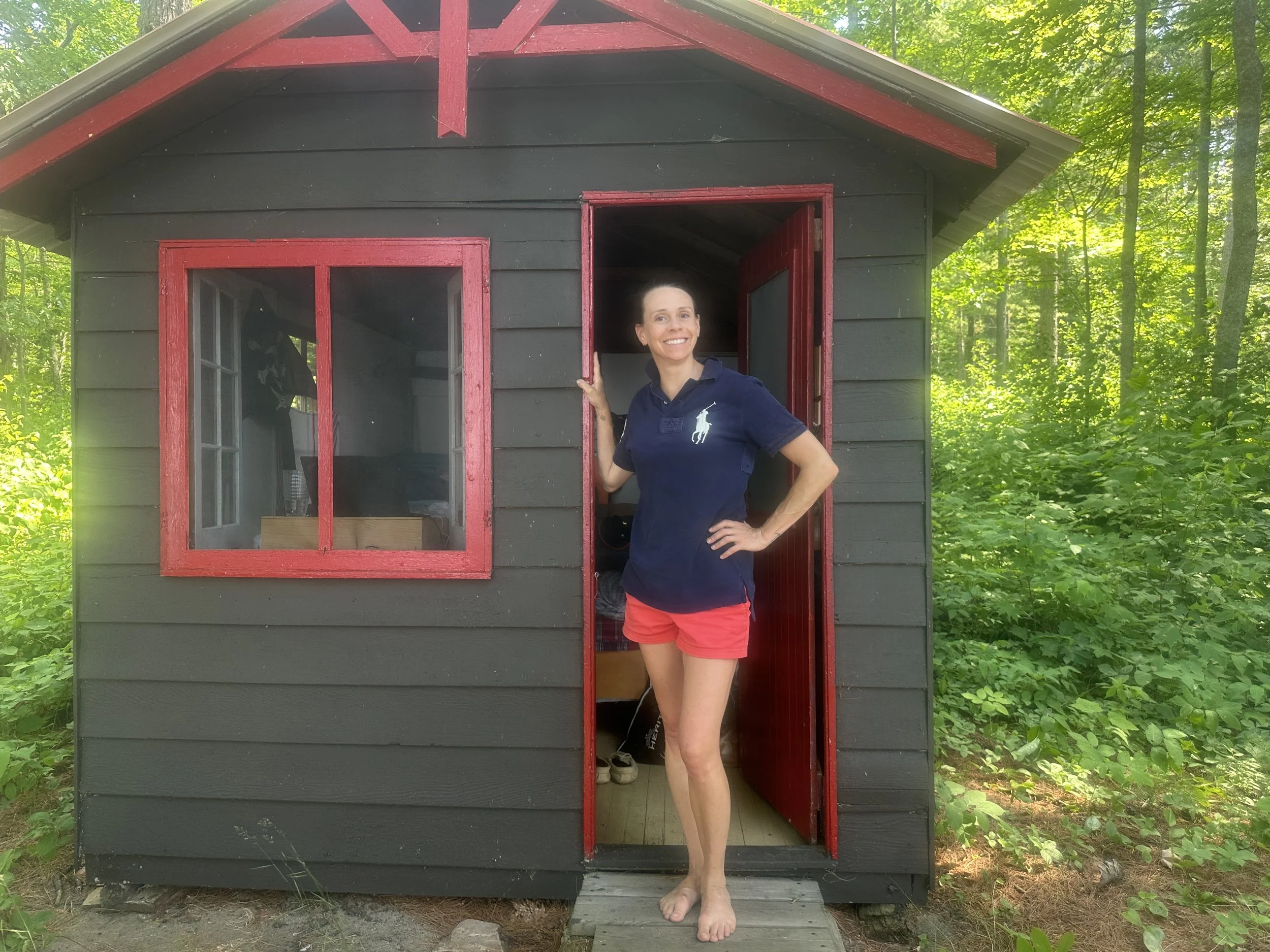 Jenni outside her work cabin