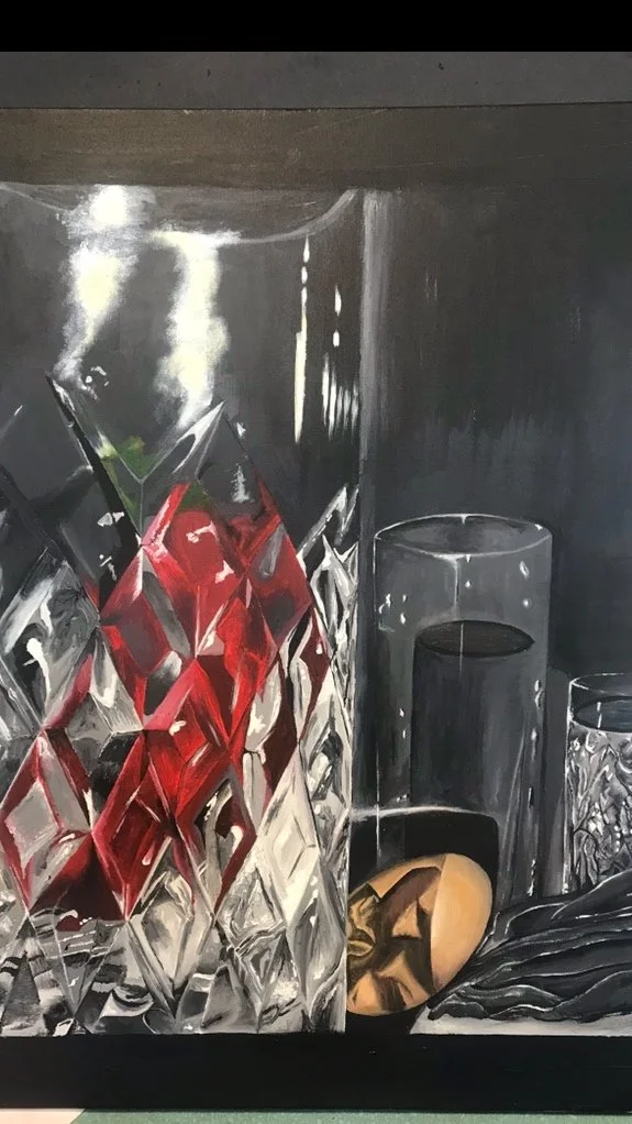 Still life painting of drinking glasses, a crystal decanter with red and clear sections, a dark vase, an egg, and a textured object on a black surface.