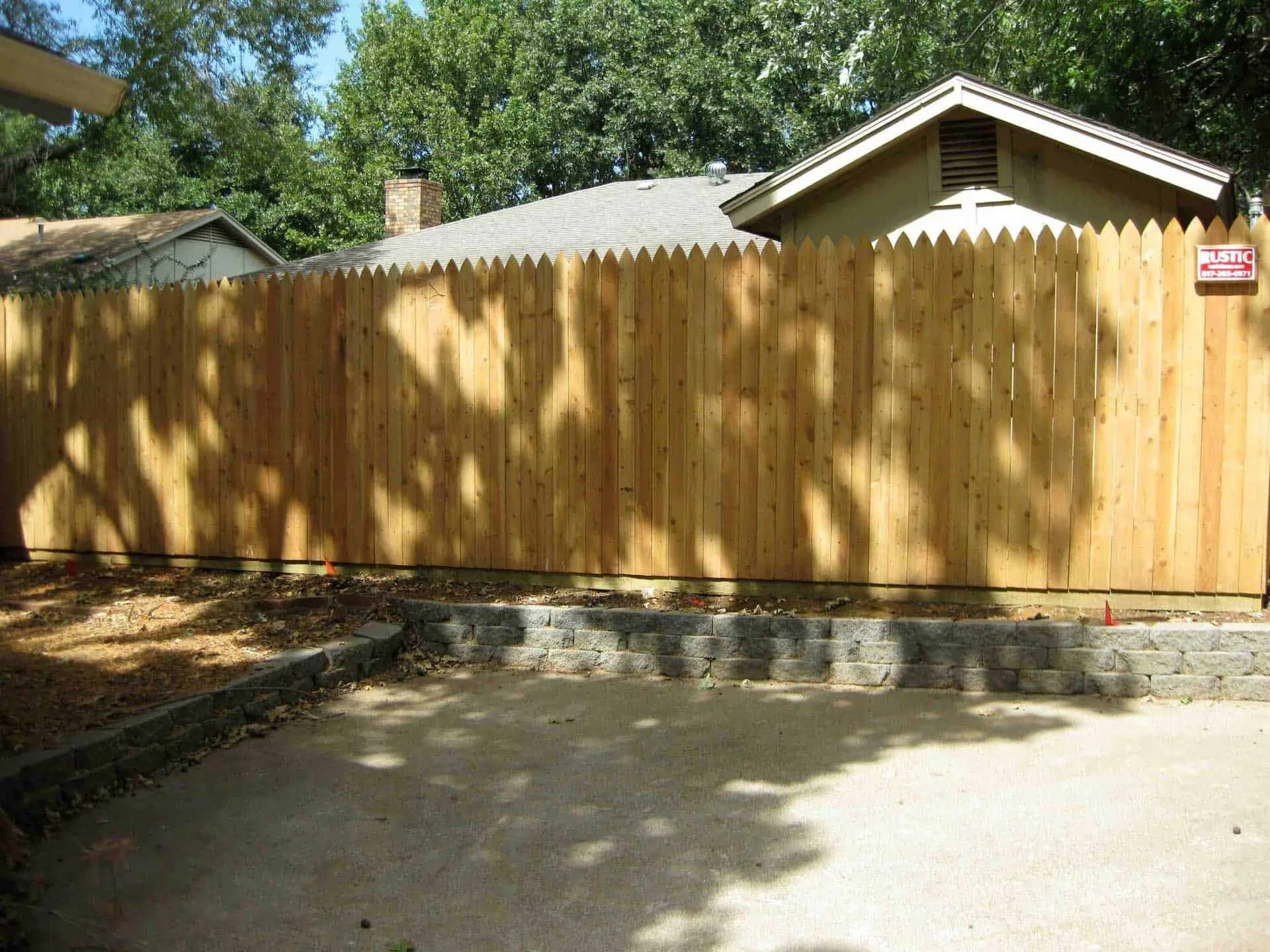 Wooden privacy fence by Rustic Fence