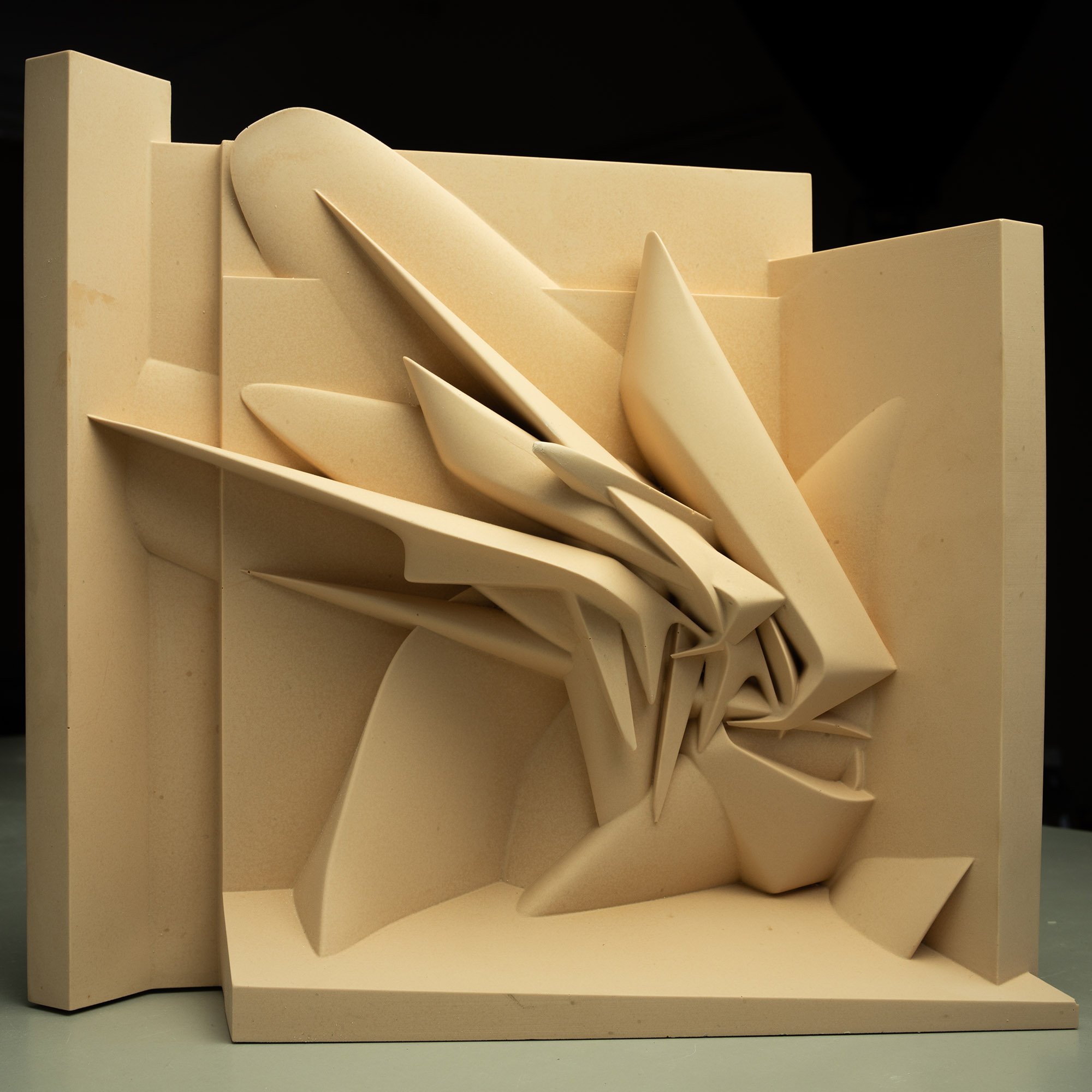 Peeta graffiti style sculpture, high density architectural mineral composite casting. Brutal Corner 2026