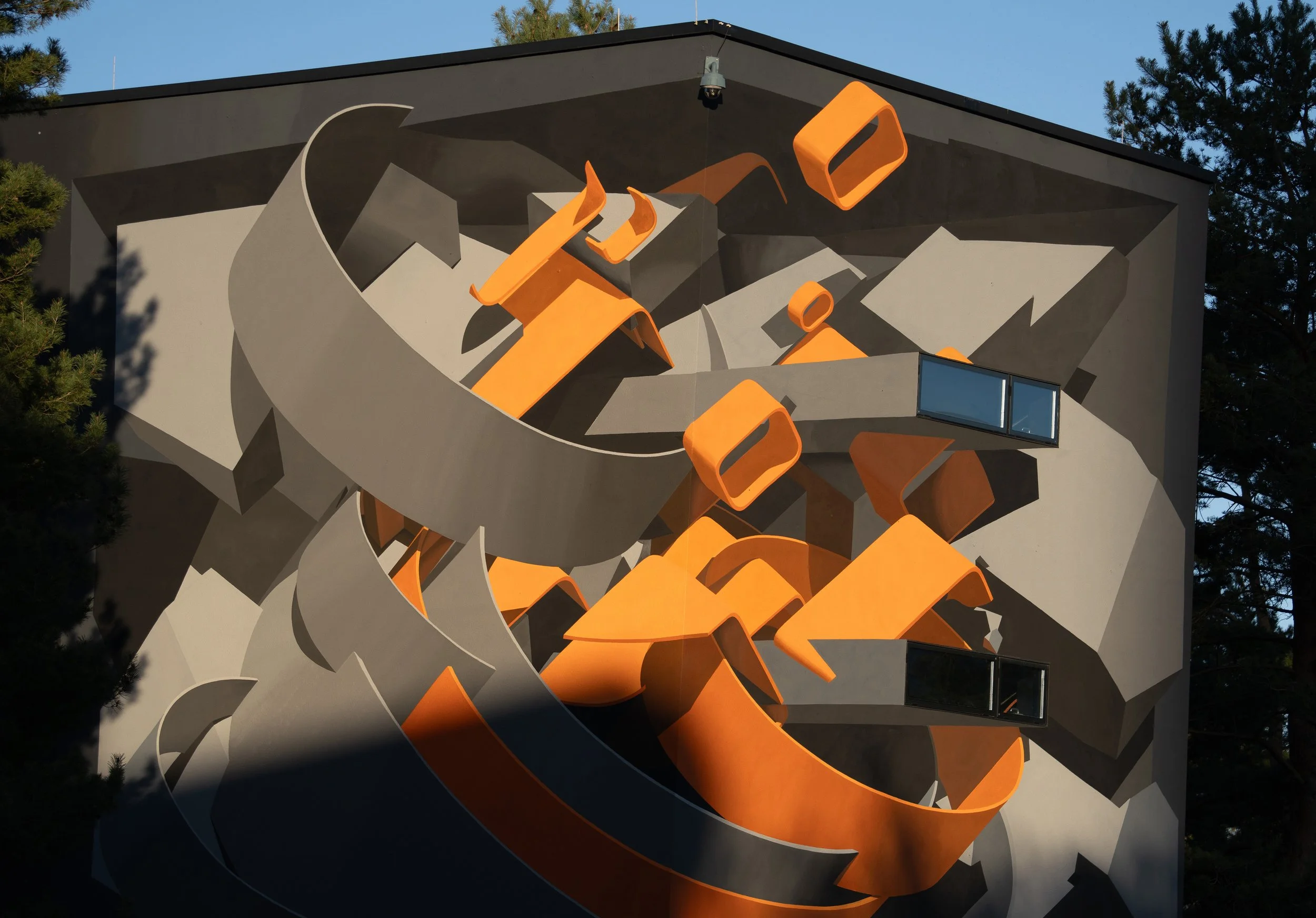 Anamorphic mural by Peeta for Autostadt HOG Pavillion in Wolfsburg Germany detail at sunset.