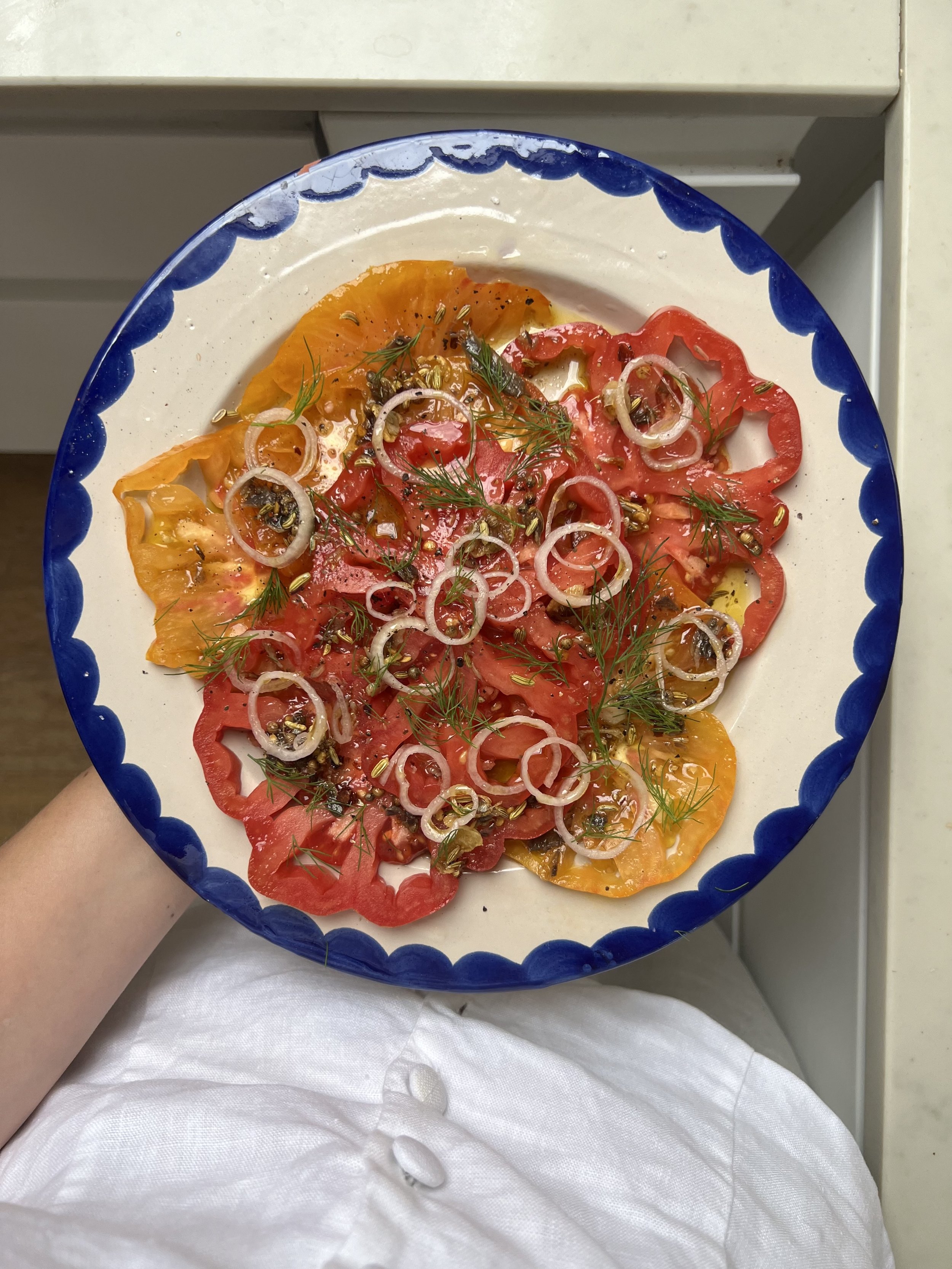 Tomatoes with sizzled anchovy oil