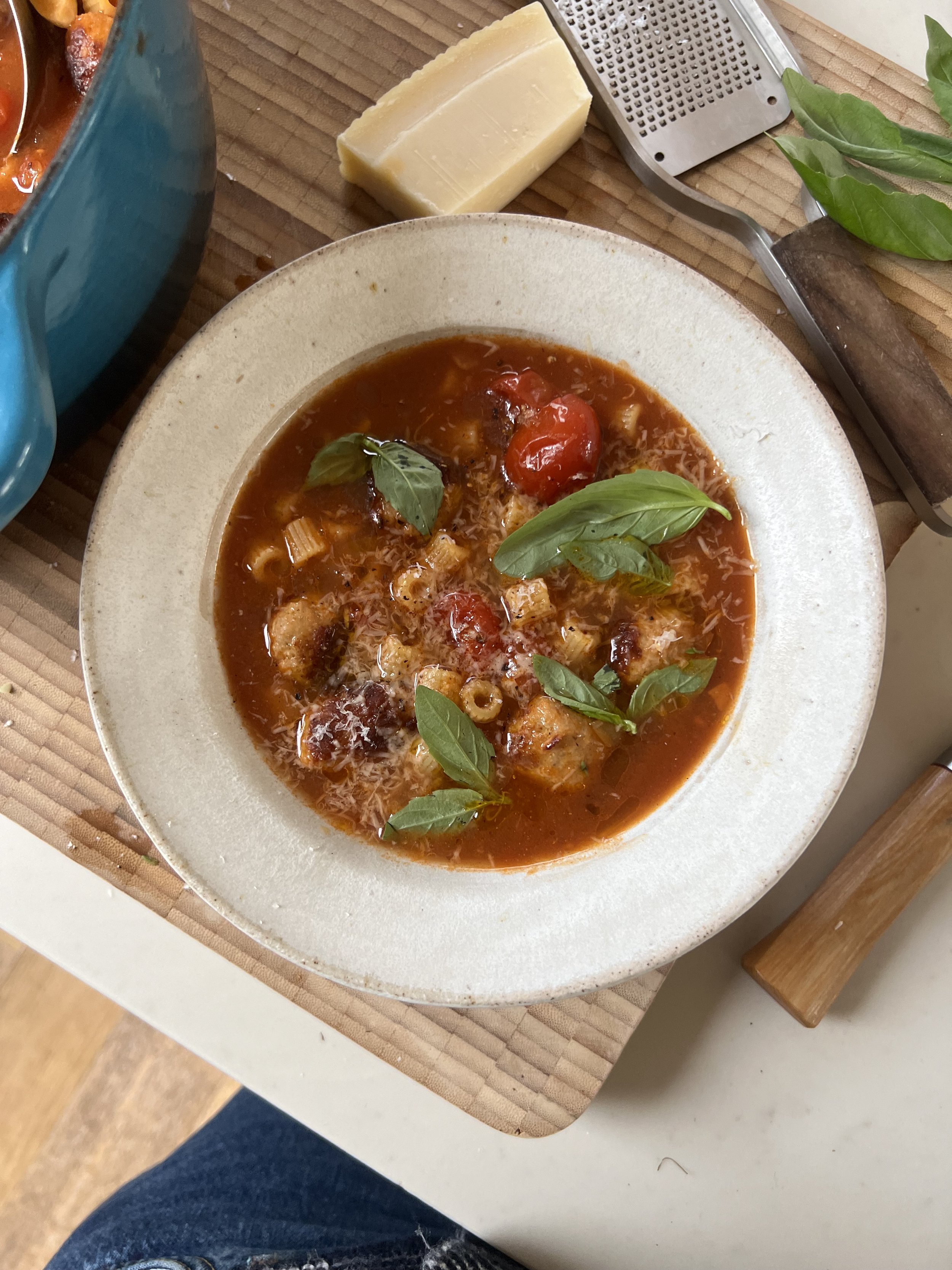 Sausage meatballs in tomato broth with tiny pasta
