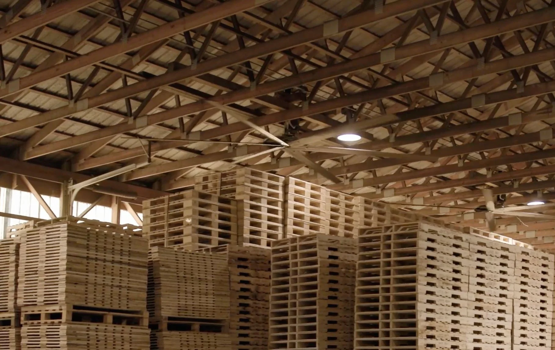 Shade Lumber doterage warehouse with fans that help with air flow and mold prevention