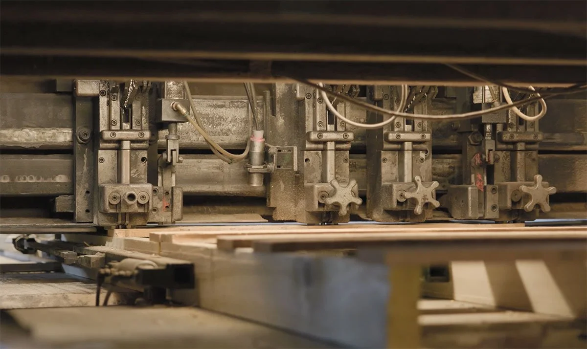 nailing machine nailing a wooden pallet