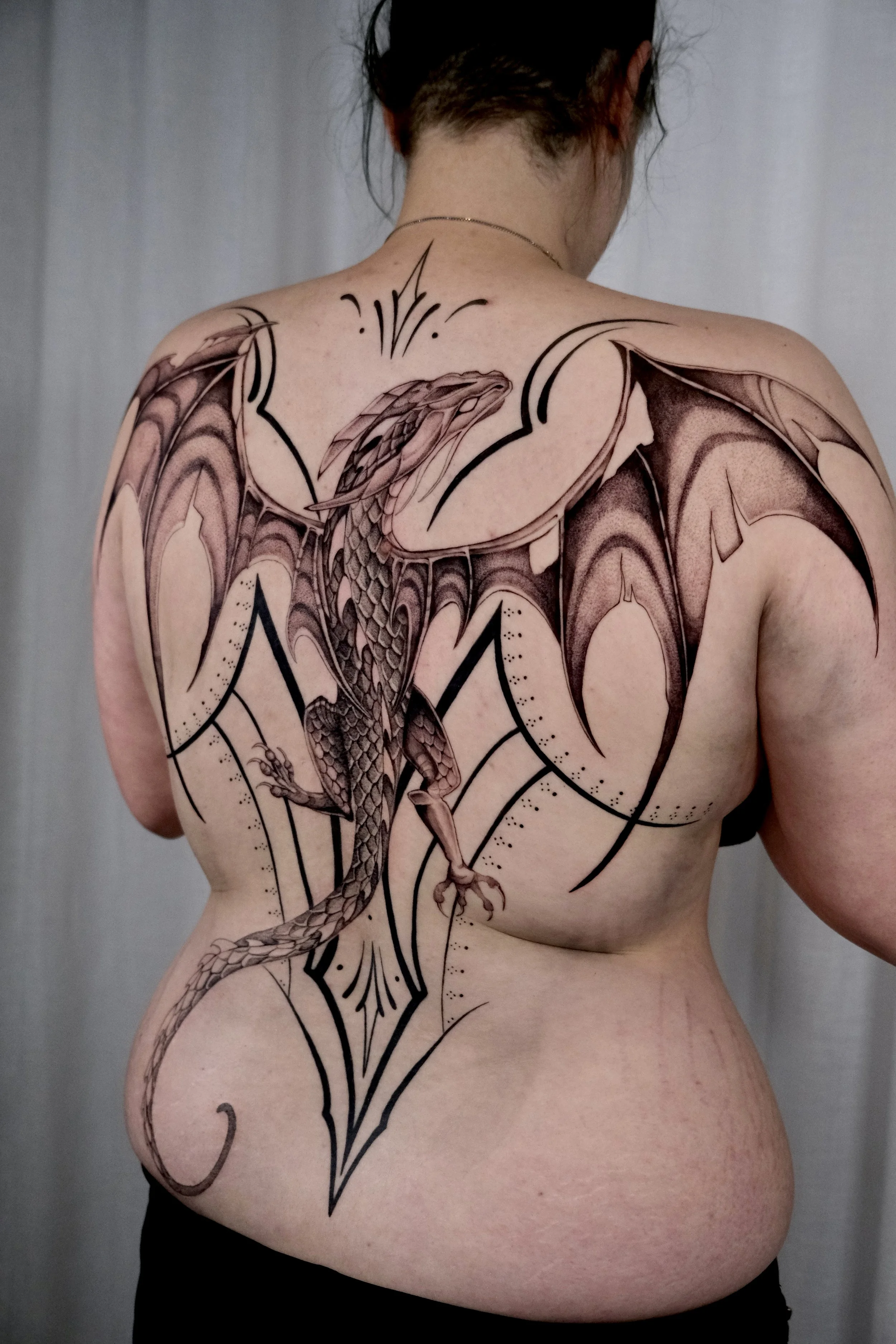 dragon backpiece tattoo