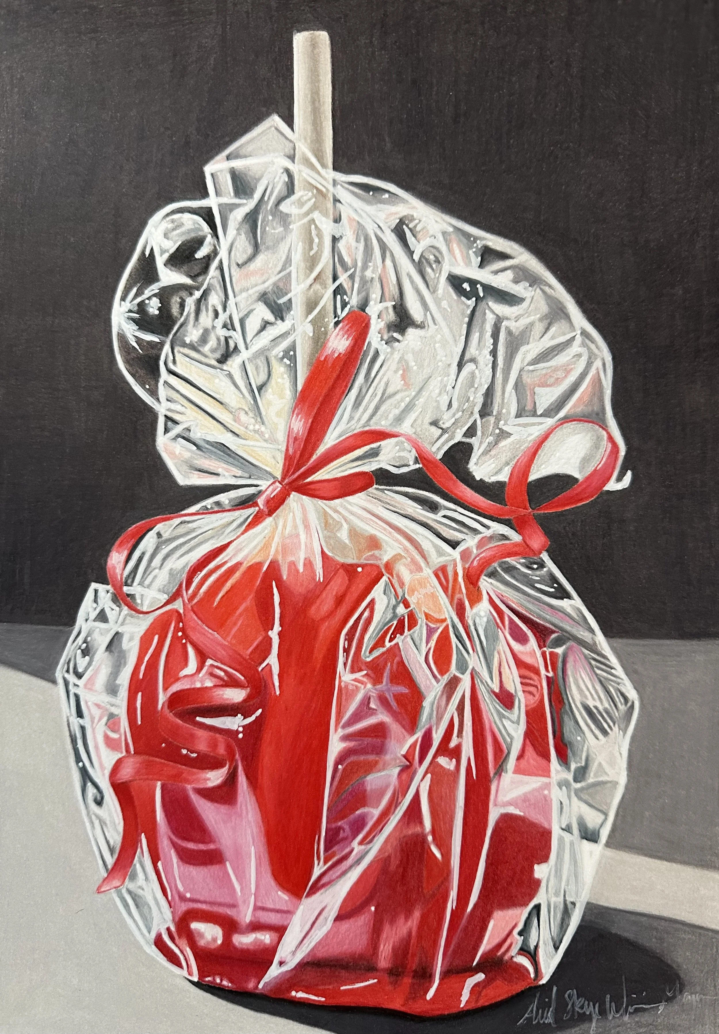 a drawing of a candy apple wrapped in celophane.