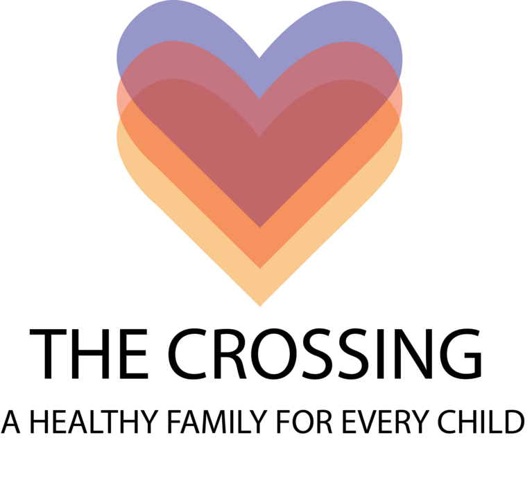 A stylized heart with layered colors in shades of blue, red, orange, and yellow.