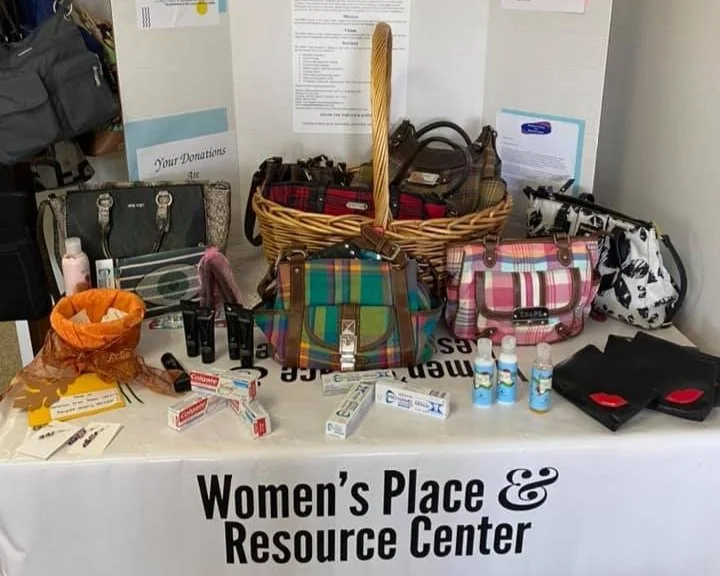Womens-place-resource-center-purse-with-a-purpose-donation-contents.jpg