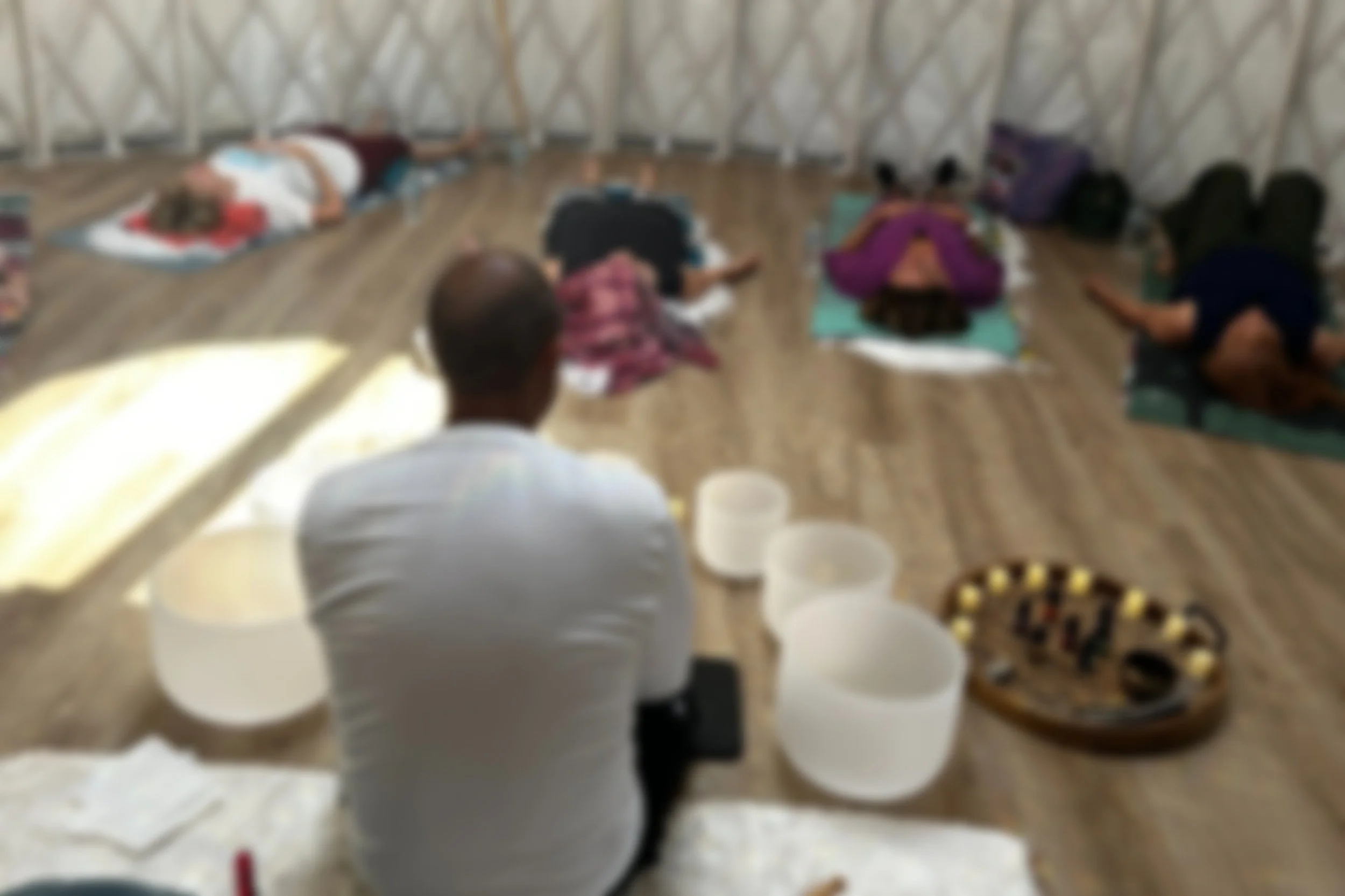 Bernadette of Cosmasoul playing the sound bowls