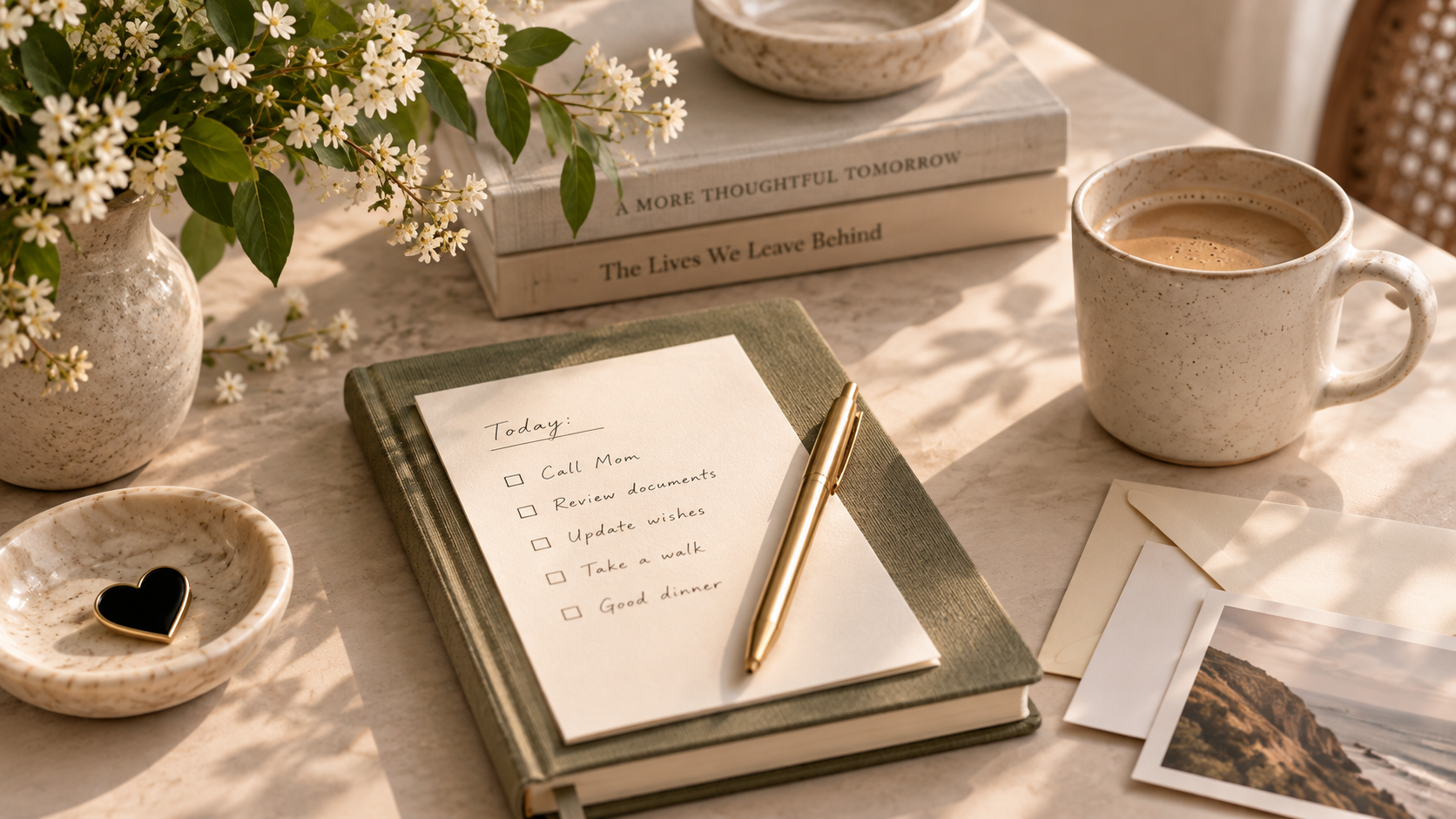 A sunlit table with flowers, coffee, a planning notebook, family photographs, and a handwritten to-do list for reviewing end-of-life wishes.