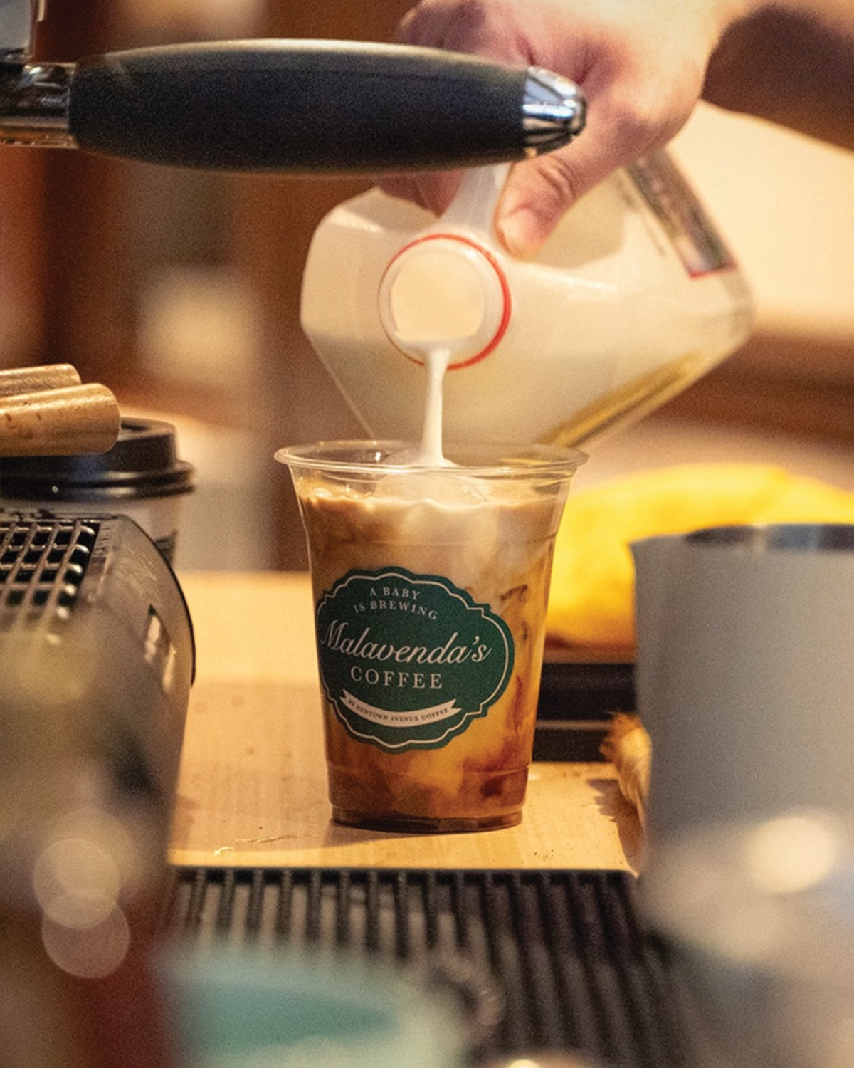 Custom cup stickers for a baby shower with Holiday Market theme on Long Island