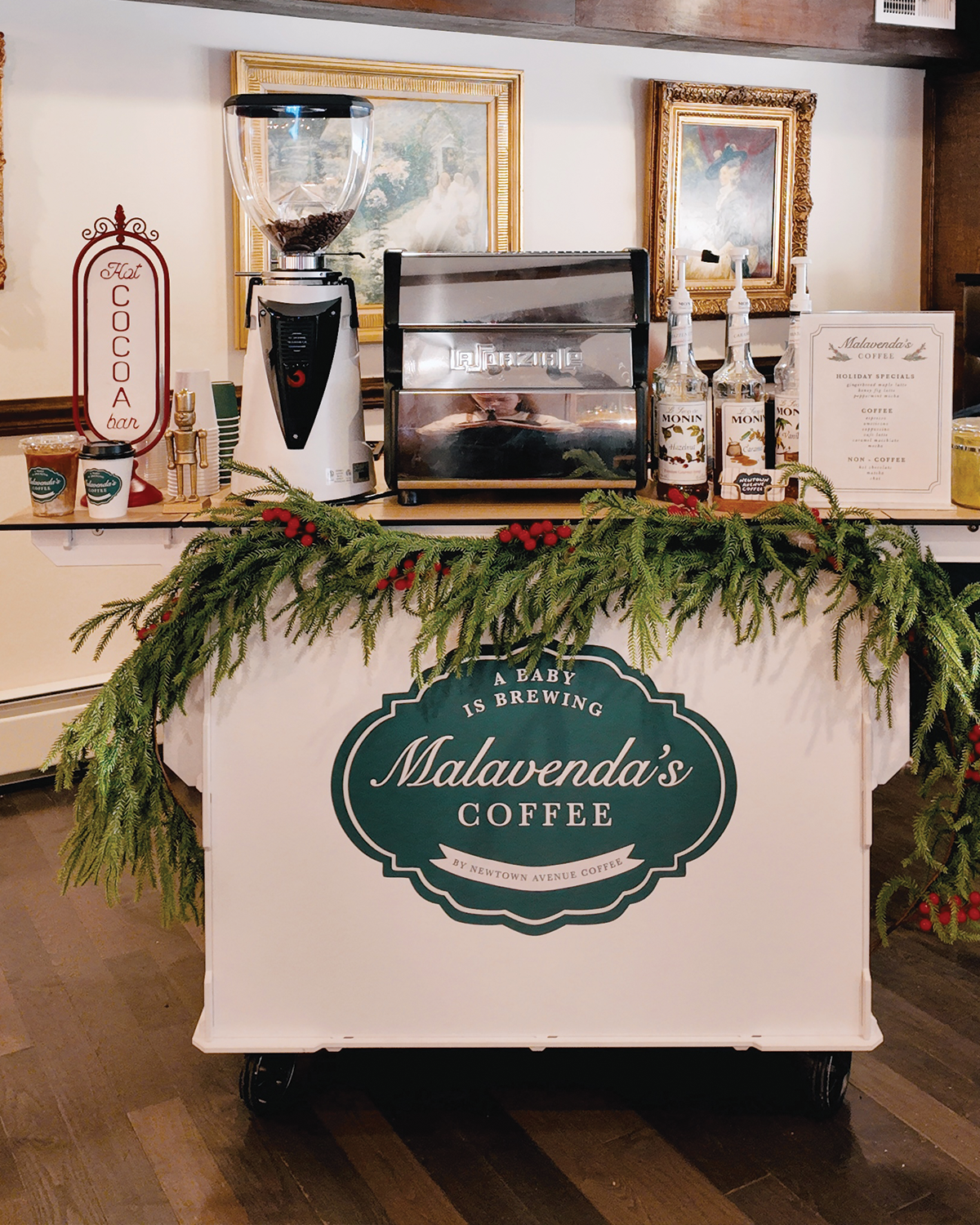 Coffee and matcha cart catering setup at a baby shower on Long Island with cstom cup stickers