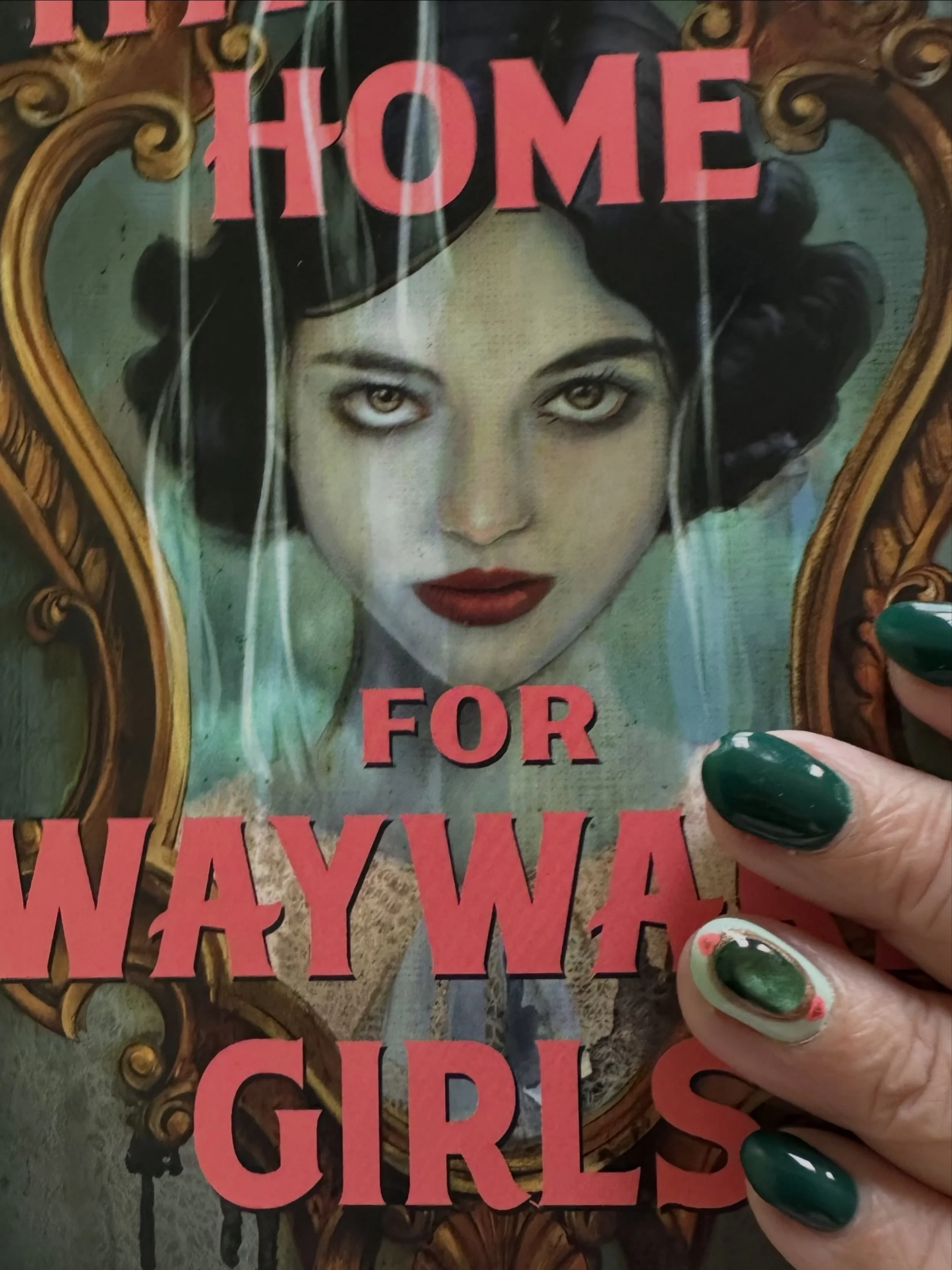 Before they get chipped, I wanted to share the fun nail art that I got to match my book cover! Last time I went with a coral like the title treatment, so this time we did a deep green and this cute cat-eye-effect mirror! Thanks, OJ from the Capitol H