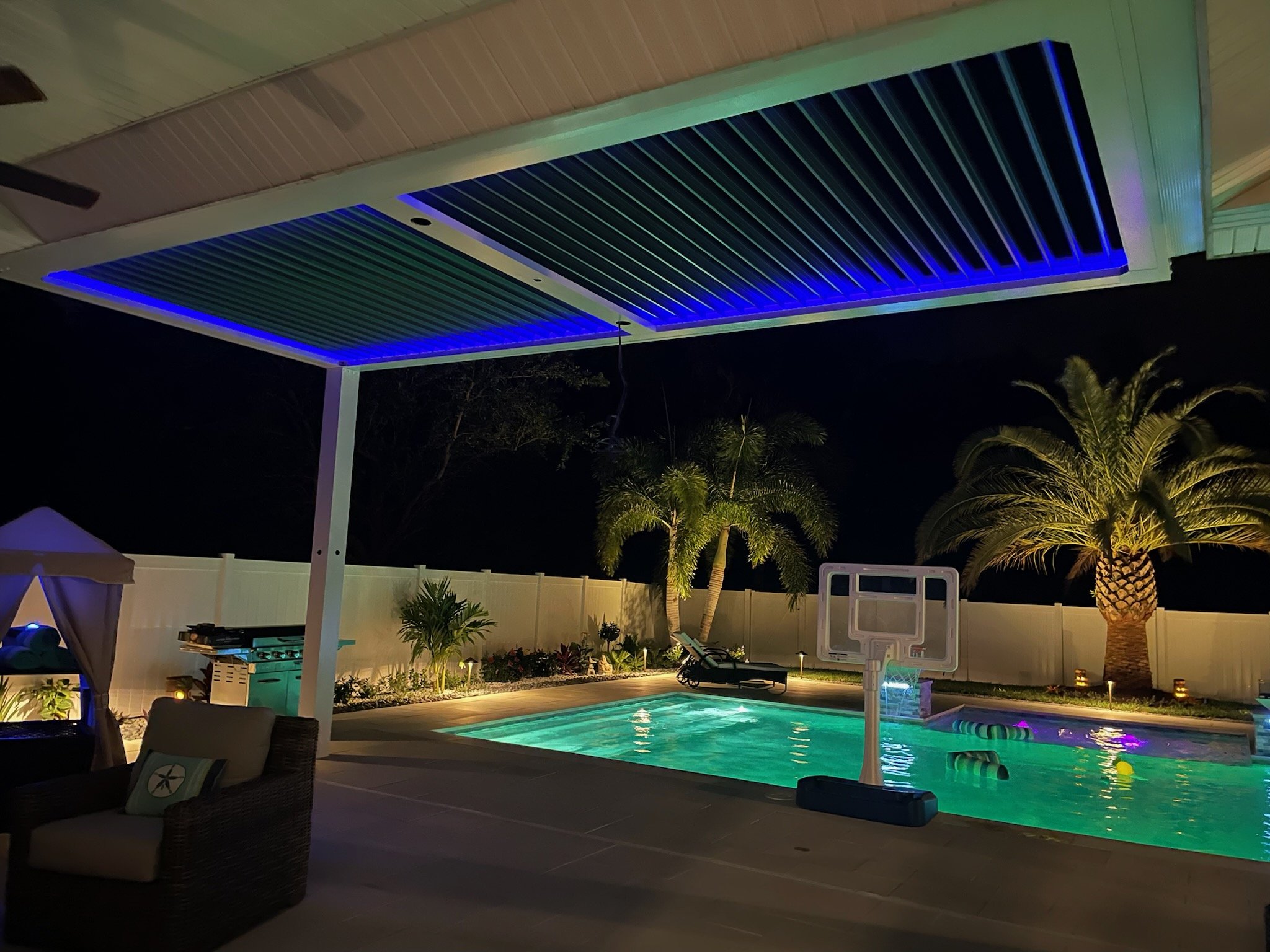KAP Electric provided the electric to add a Pergula to compliment this already gorgeous outdoor pool area with blue accent lighting.