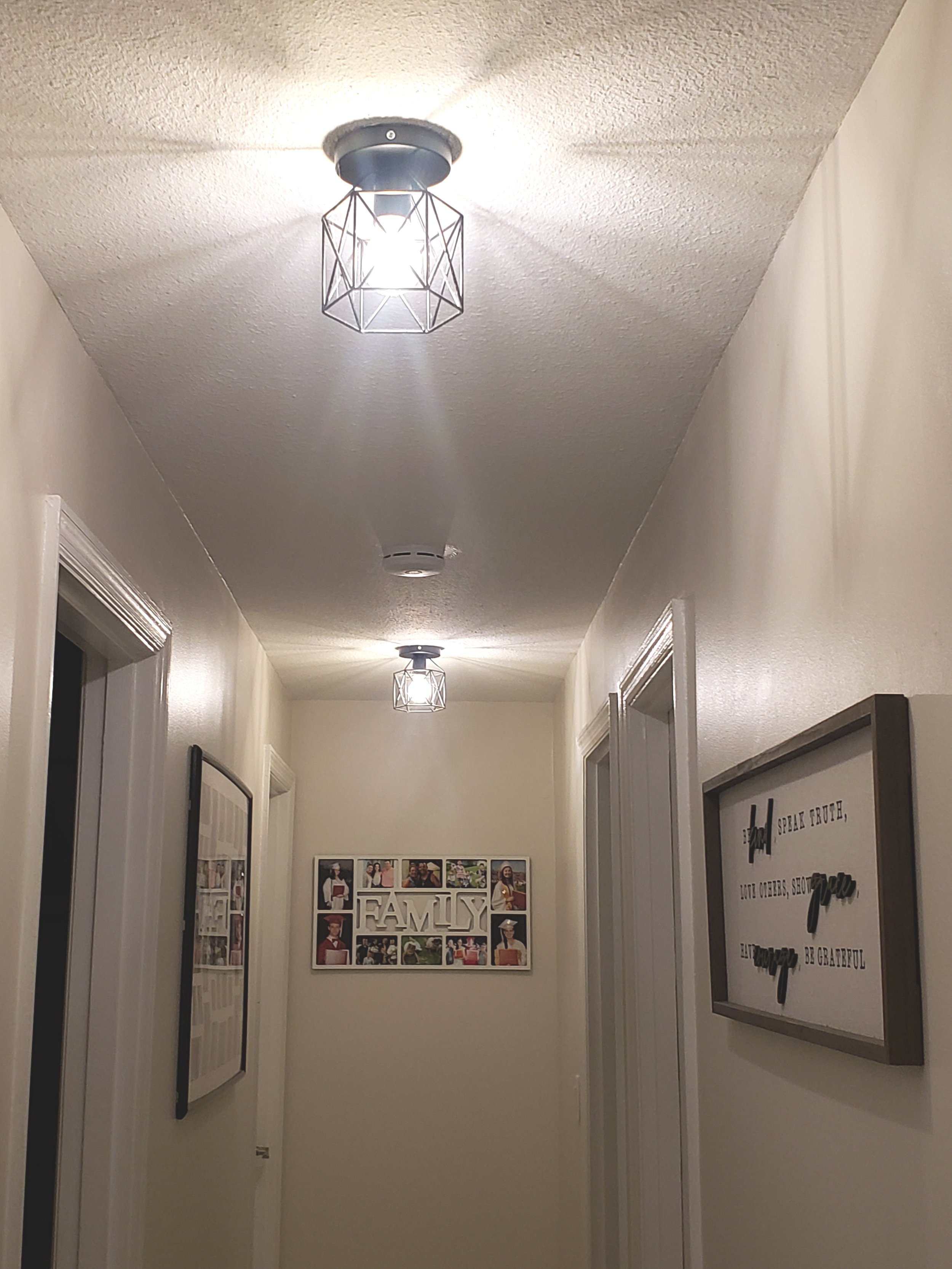 Installation of new hallway fixtures and while we were there, noticed that we needed to add a carbon smoke detector to bring the home up to NEC code!