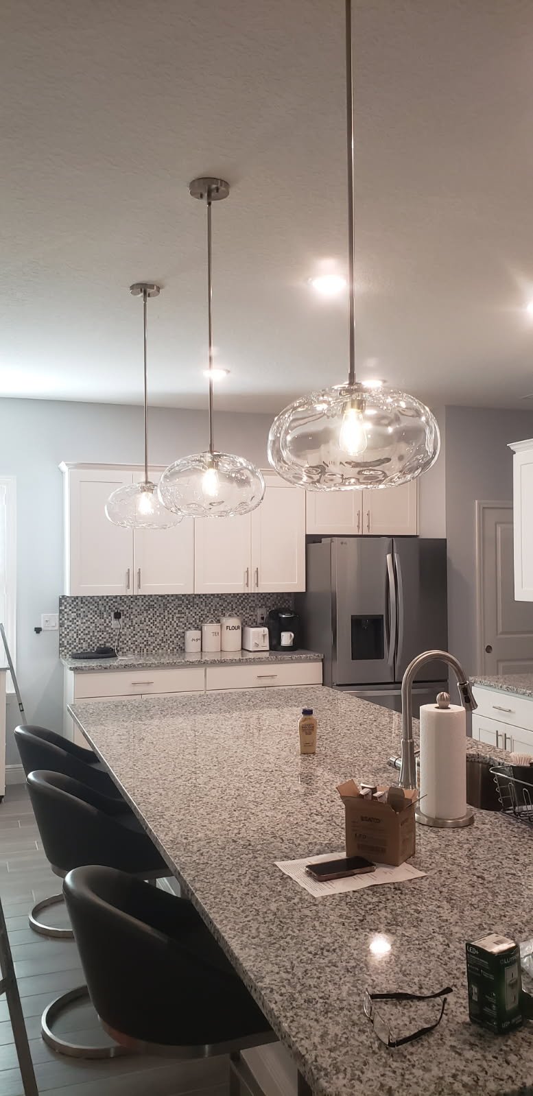 These new pendant light fixtures created a cozy, modern atmosphere that complements their existing decor.