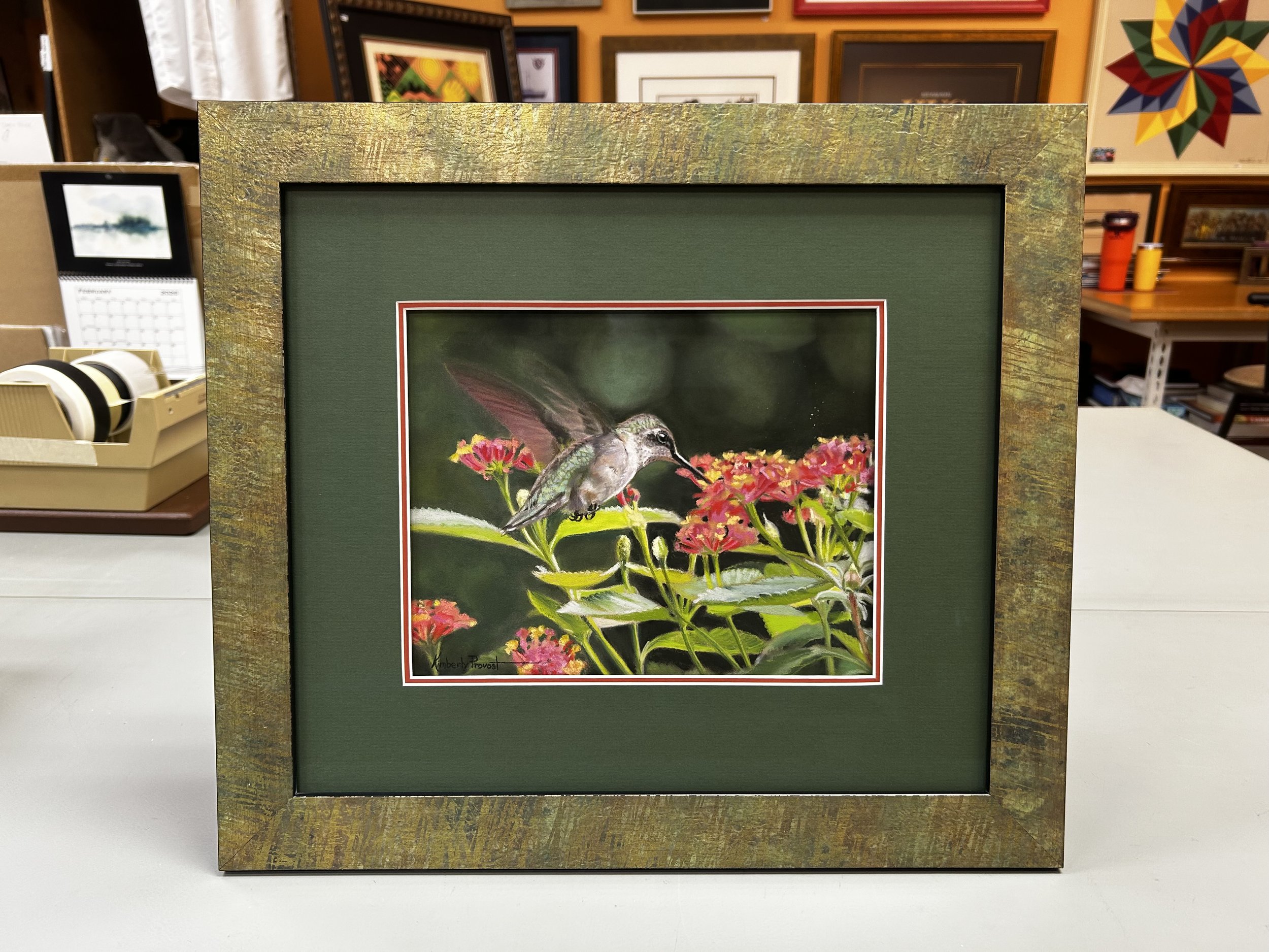 Framed pastel painting of a Ruby-throated Hummingbird by Kimberly Provost