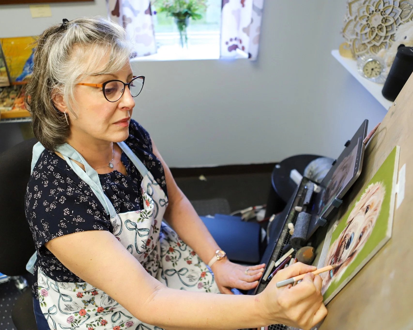 kim drawing at an easel