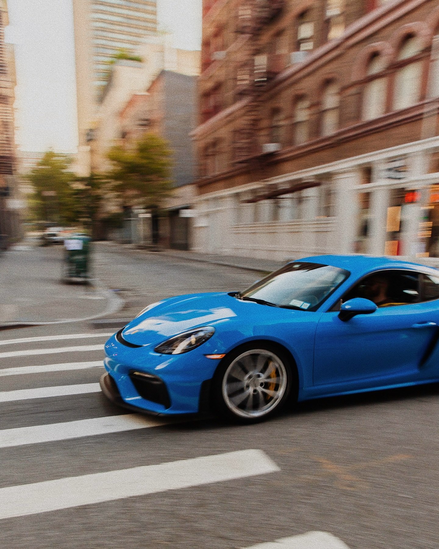 Who&rsquo;s world is this?

Shark Blue 718 GT4 captured in SoHo, Manhattan, NY.