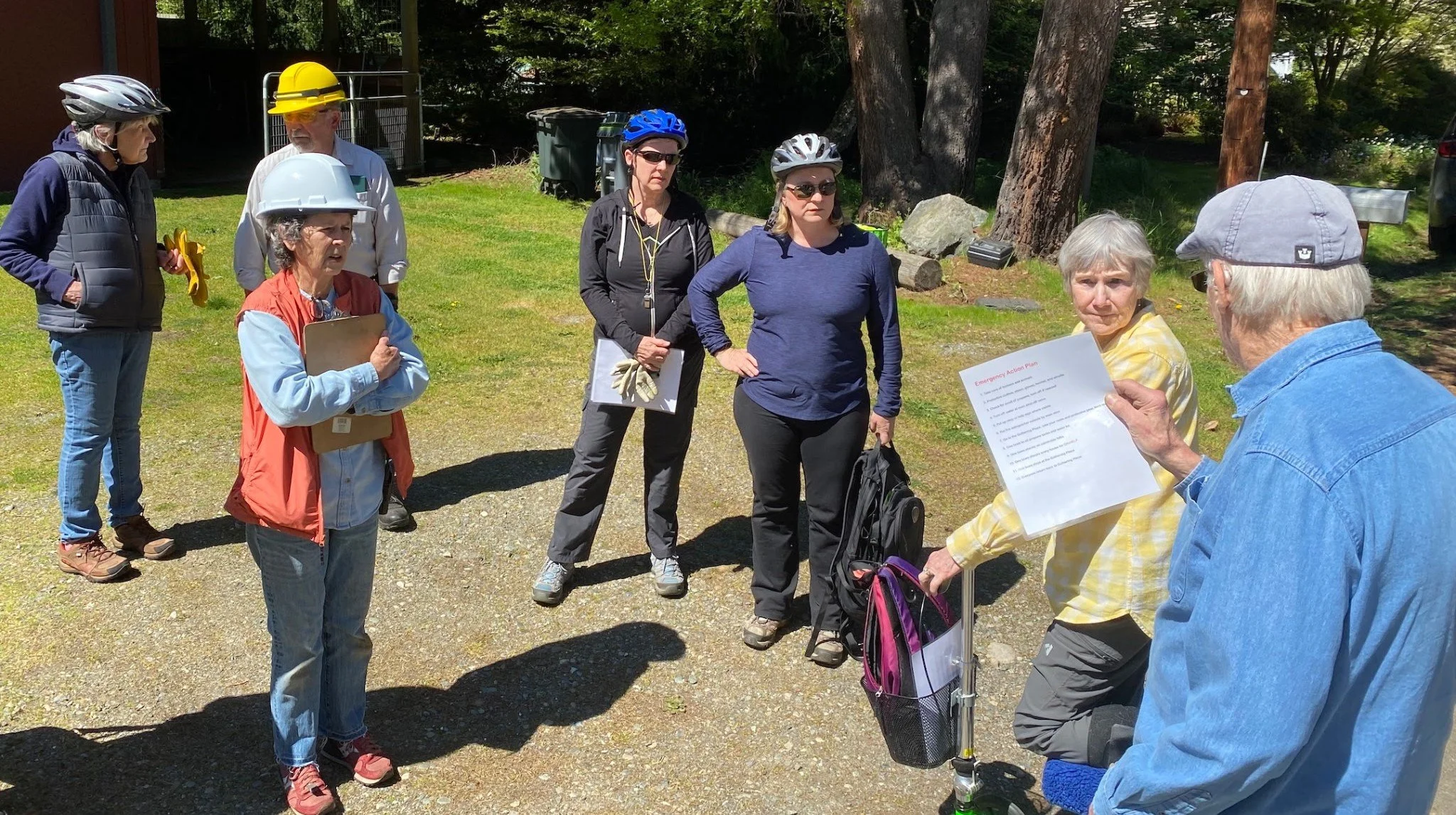 Residents of the Dines Point neighborhood gather during a drill.
