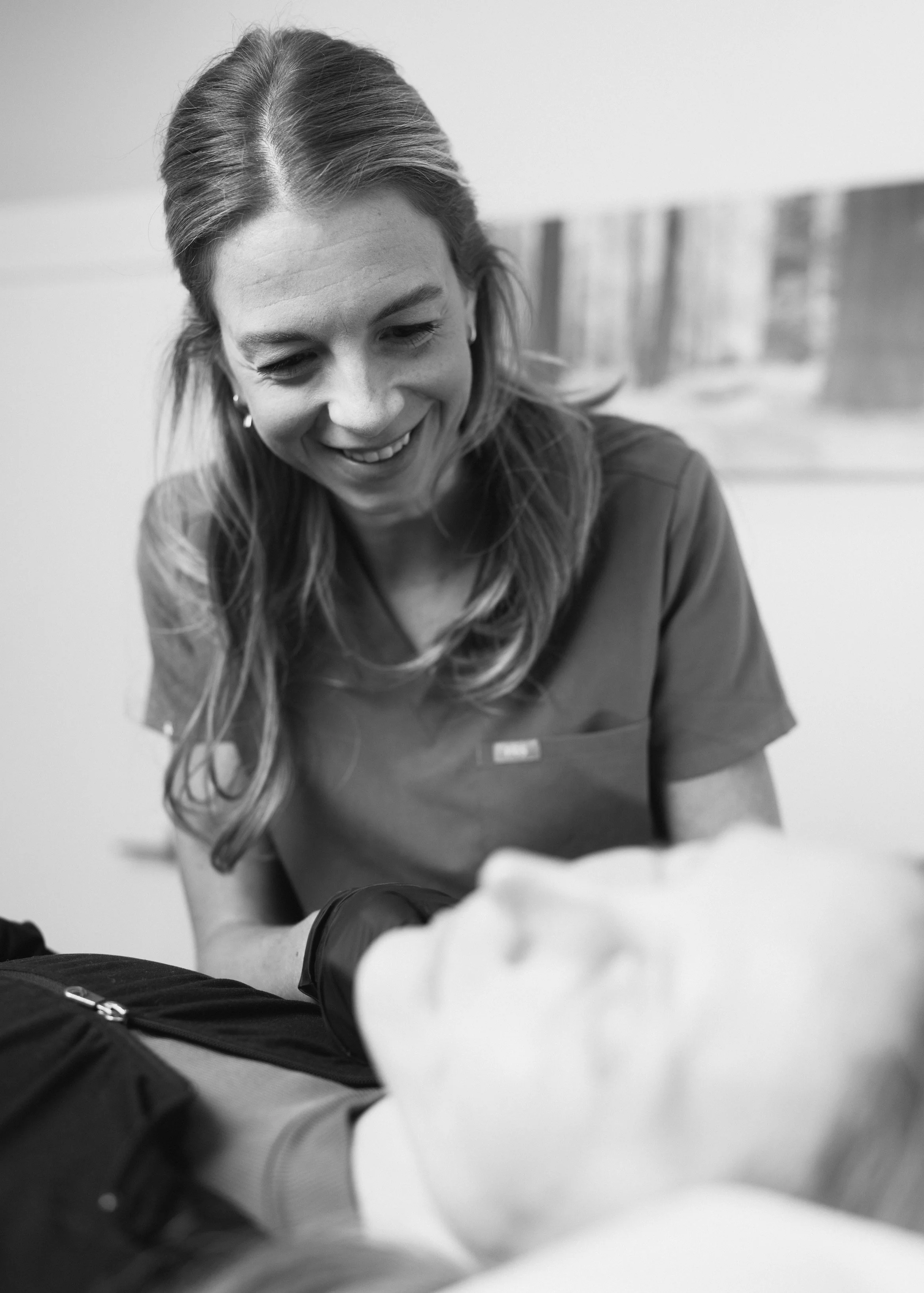 Dr. Rollheiser, ND performing microneedling and injections using platelet-rich plasma (PRP) for facial and neck rejuventation.