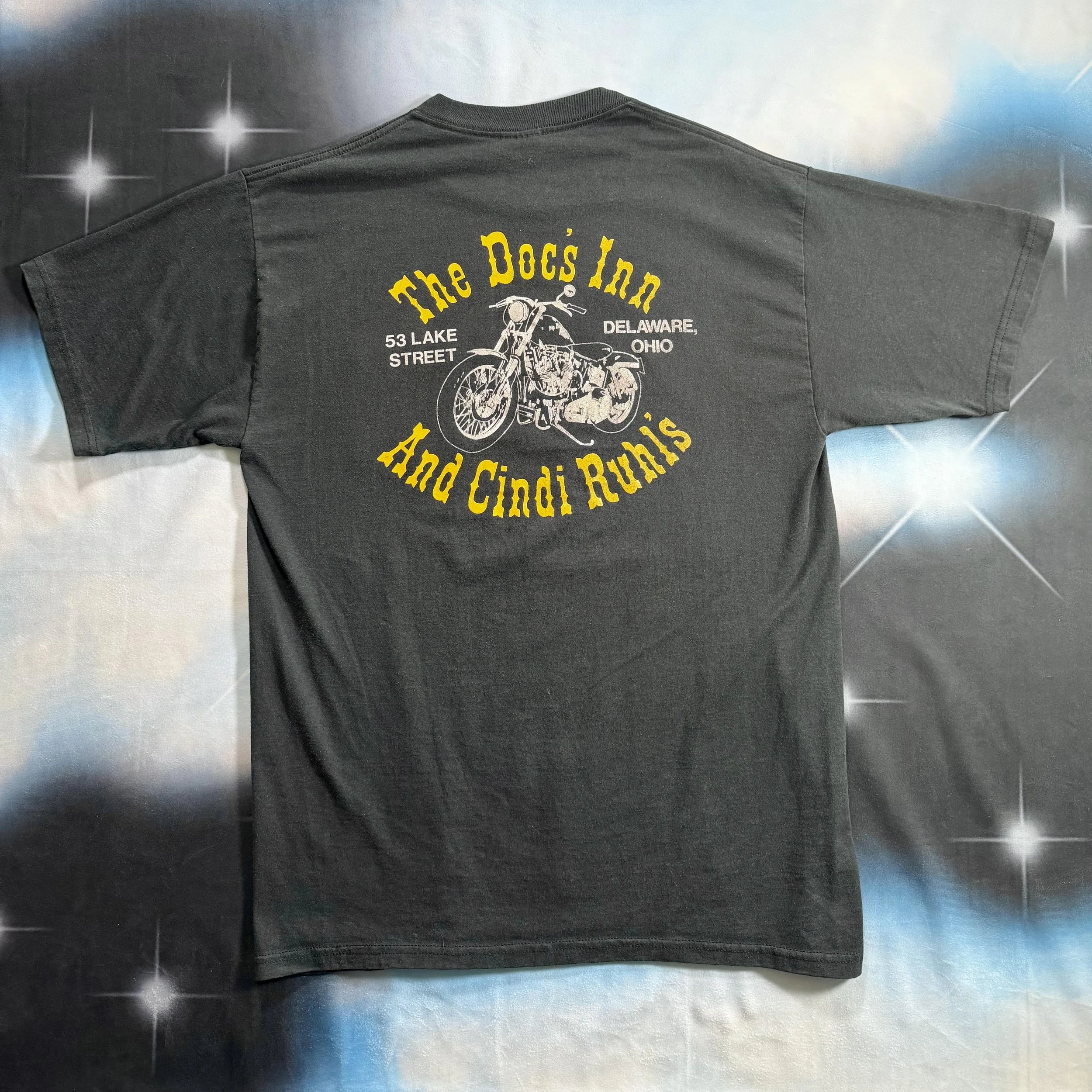vintage motorcycle shirt with text on back in bright yellow design on black charcoal fade