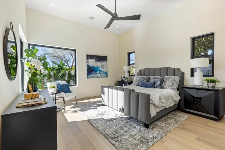Bedroom with large windows in an Arizona home