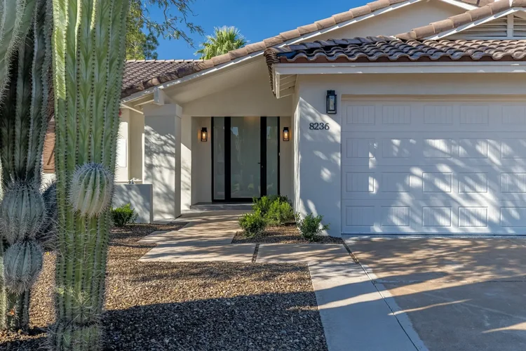 Front exterior with a covered entry