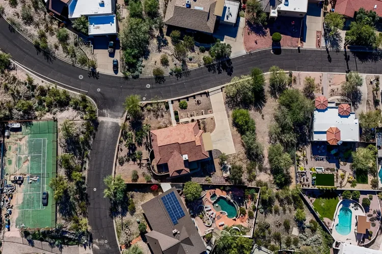 Aerial photo of a home and its neighborhood