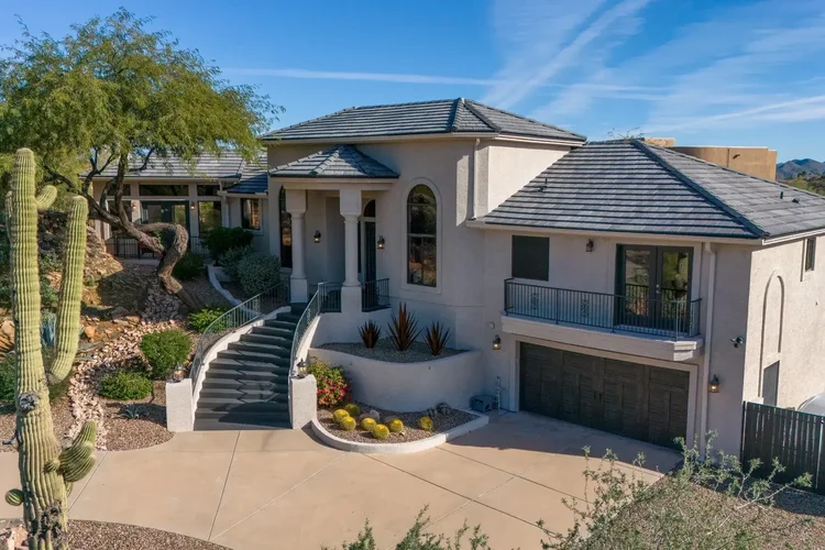Aerial photo of a home and its lot