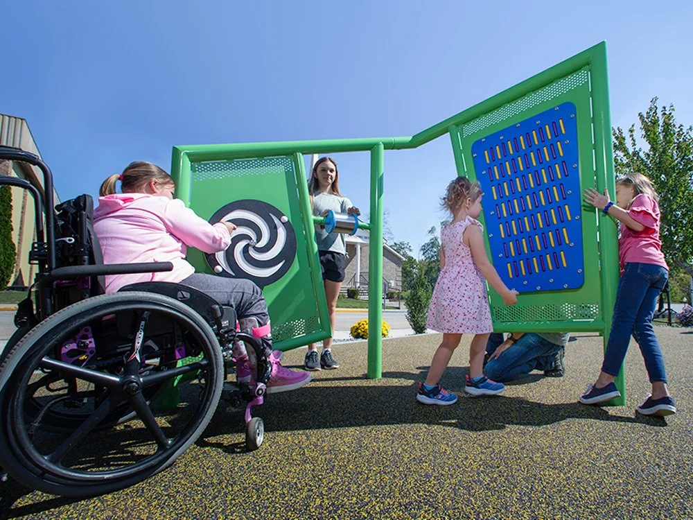 girl in accessible swing