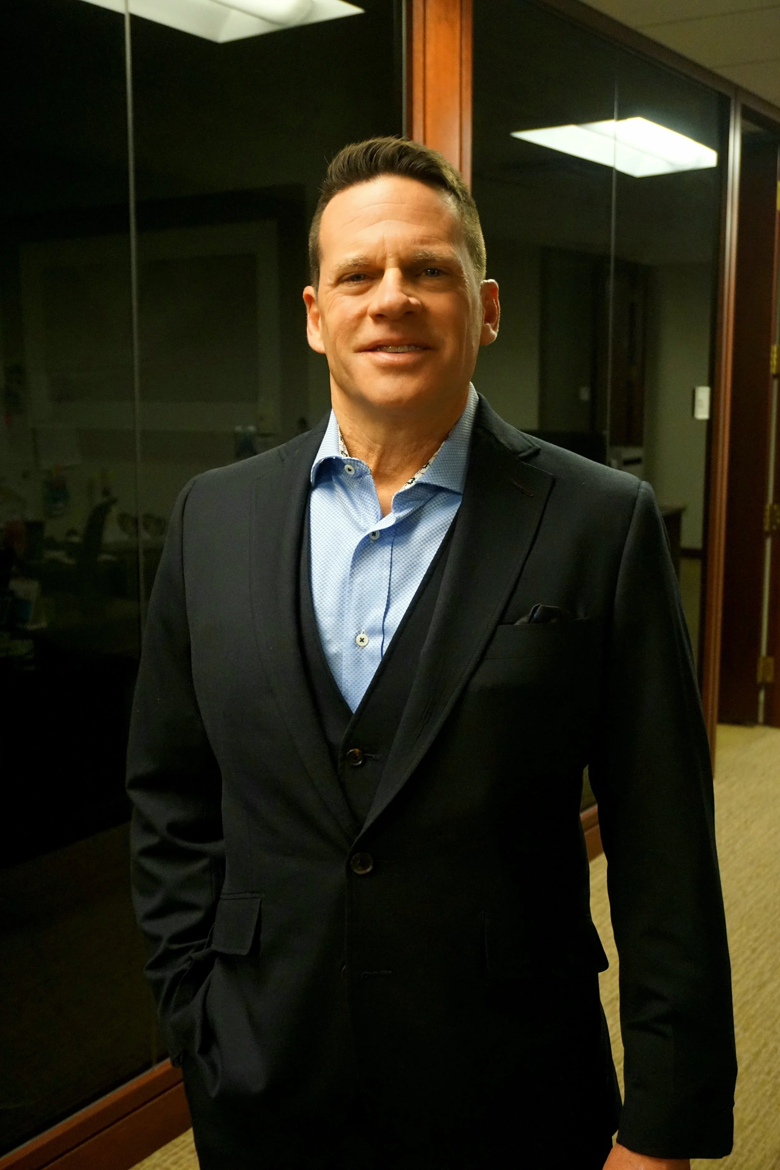 A man in a custom navy suit in Harrisburg, Pennsylvania.