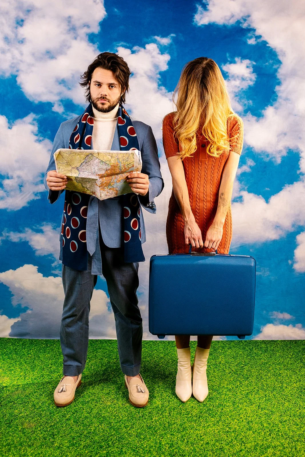 Justin W. Uglow in a blue cotton custom suit and a woman in a custom knit dress in Richmond, Virginia. Photo by Jada & David.