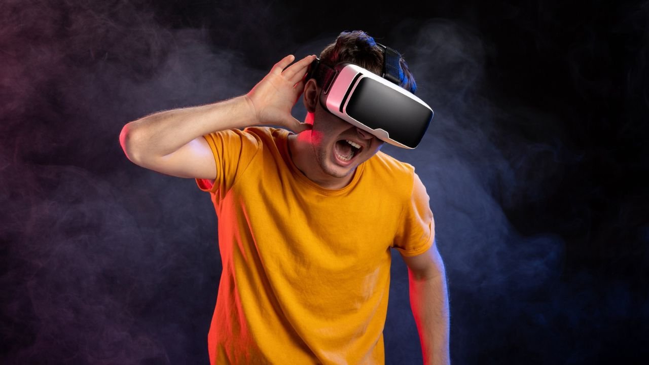 Boy wearing VR headsets and experiencing VR motion sickness symptoms.