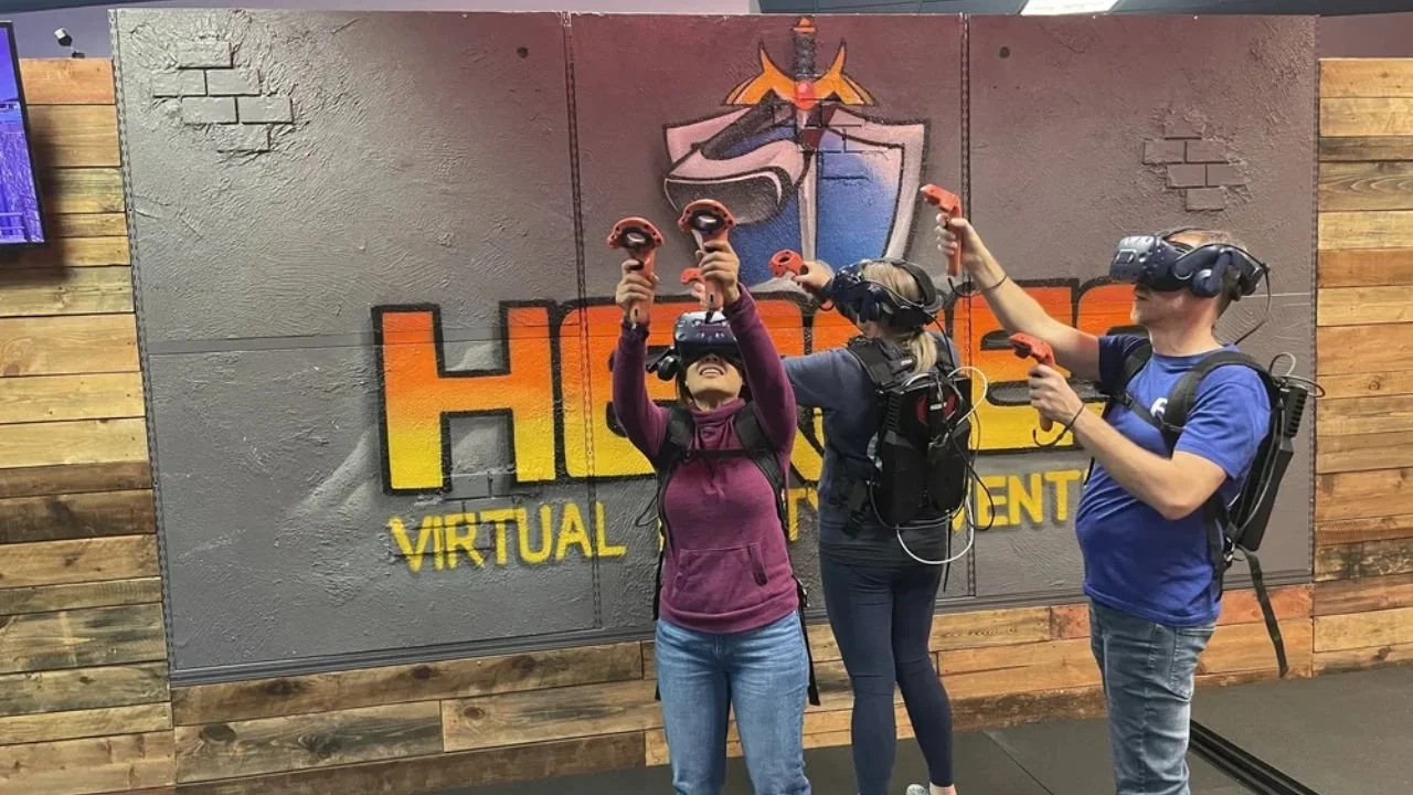 A group enjoying multiplayer VR experience in HEROES VR Adventures